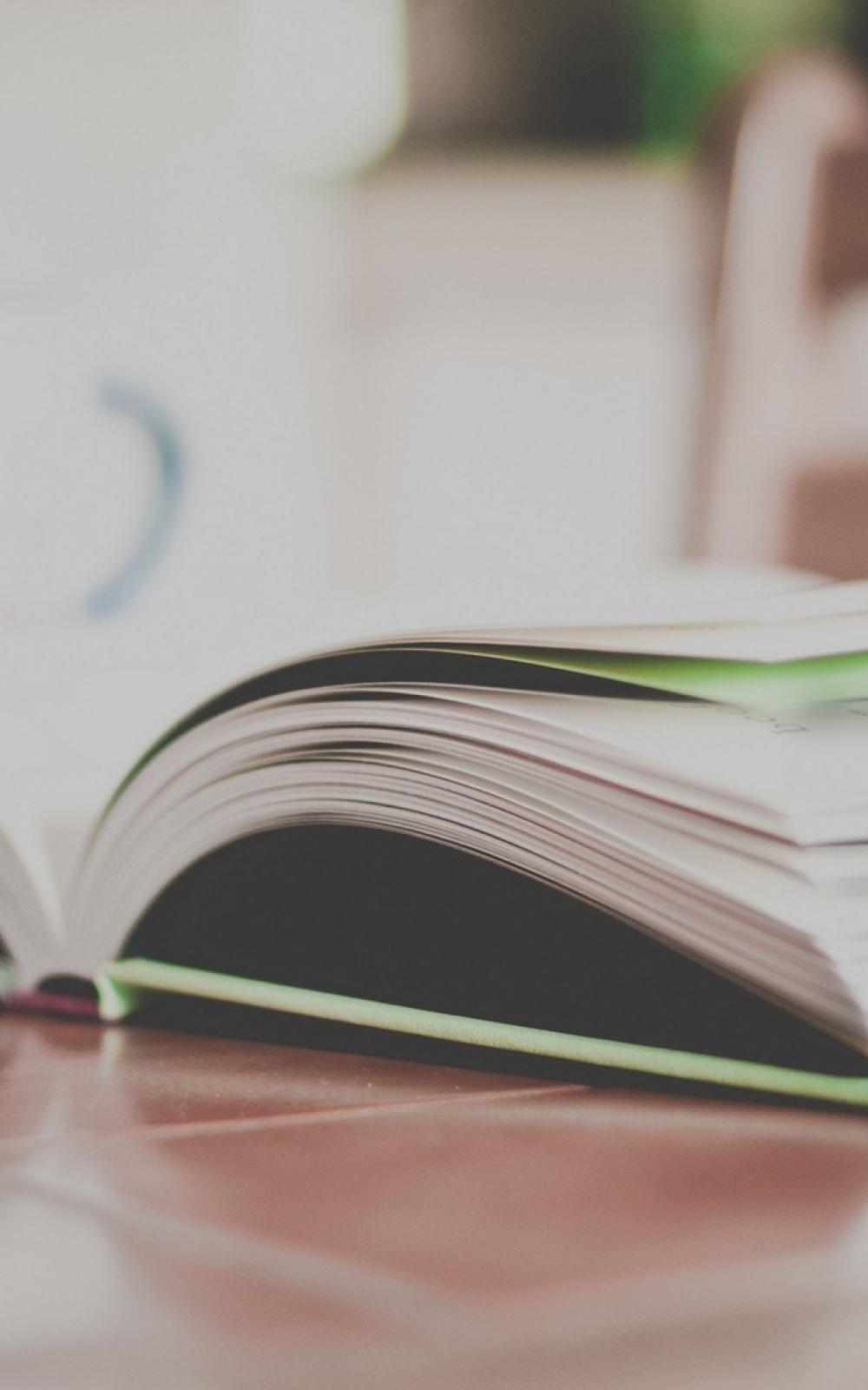 Open Book On Table Android Wallpaper free download