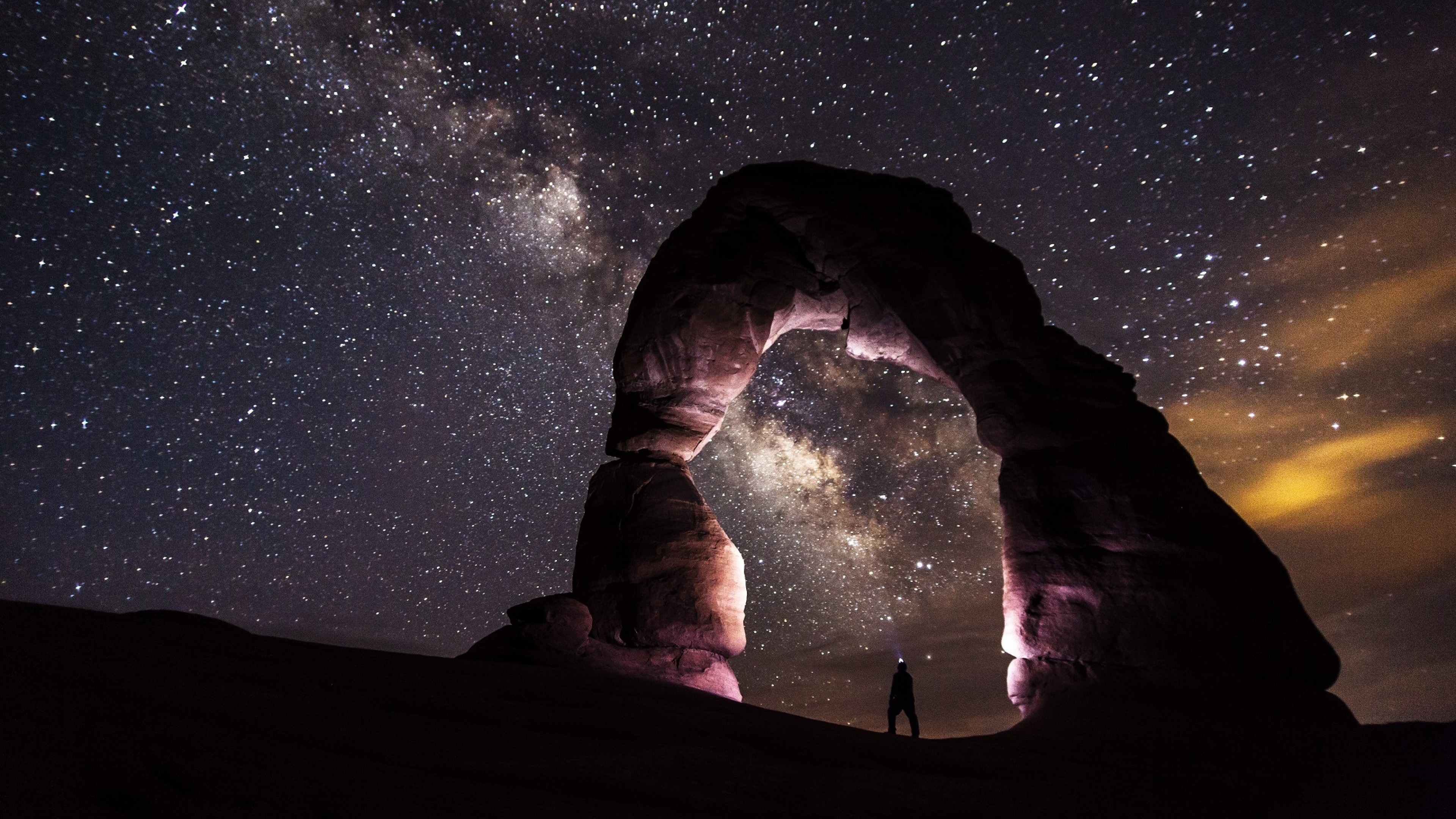 Stone Arch Under a Starry Sky 4K Ultra HD Wallpaper