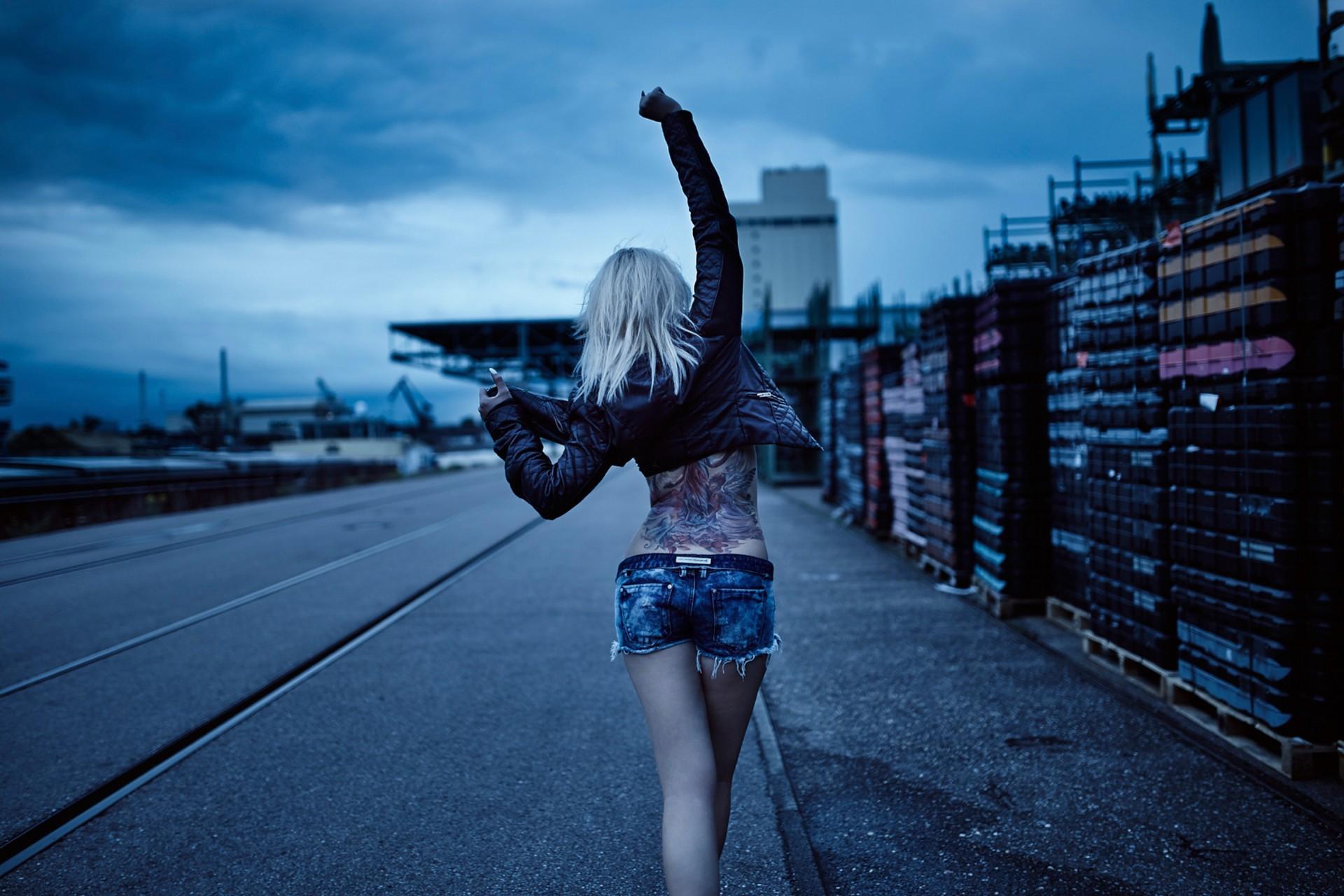 Blonde walking down the street wallpaper and image