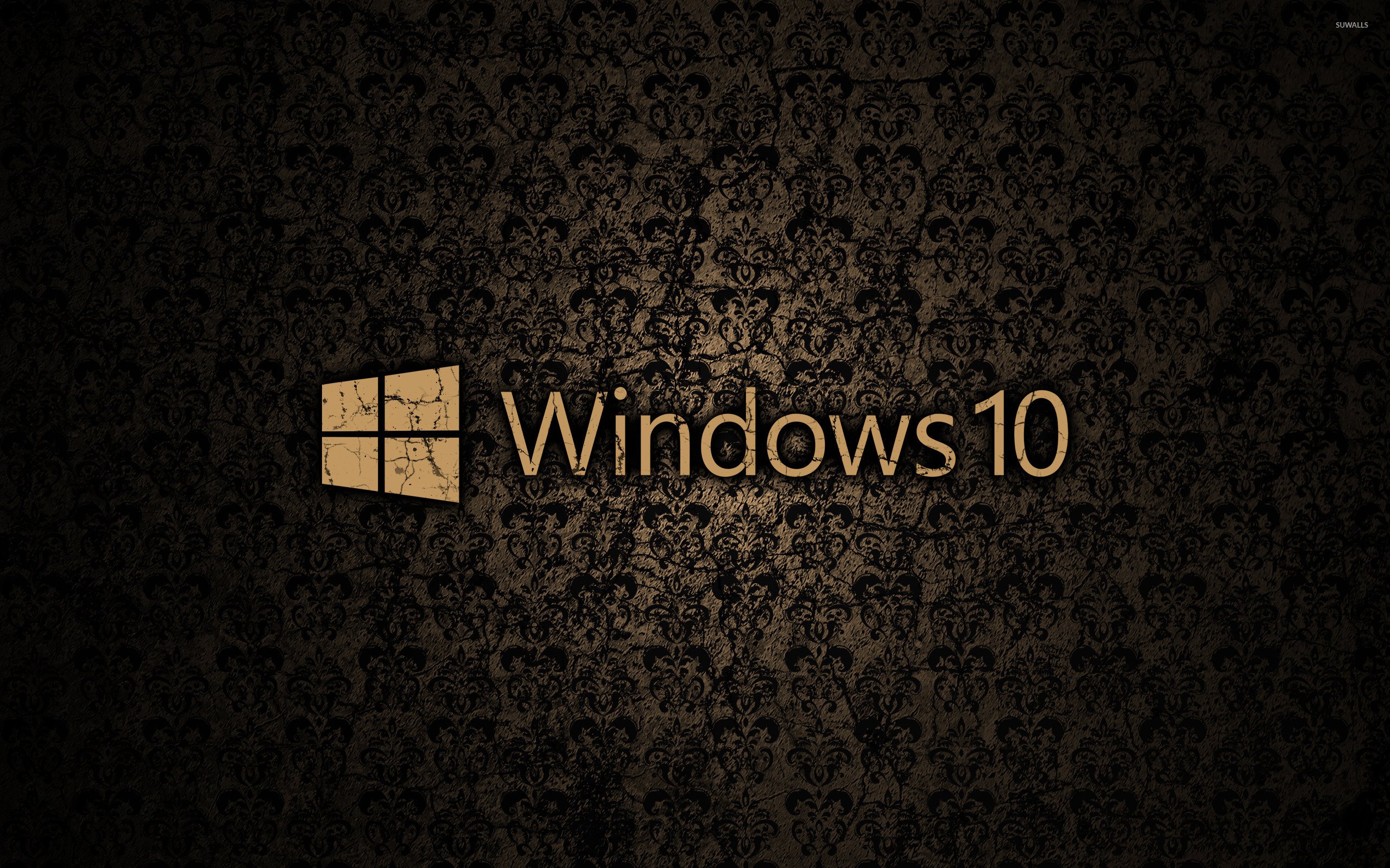 Windows 10 text logo on a cracked wall wallpaper
