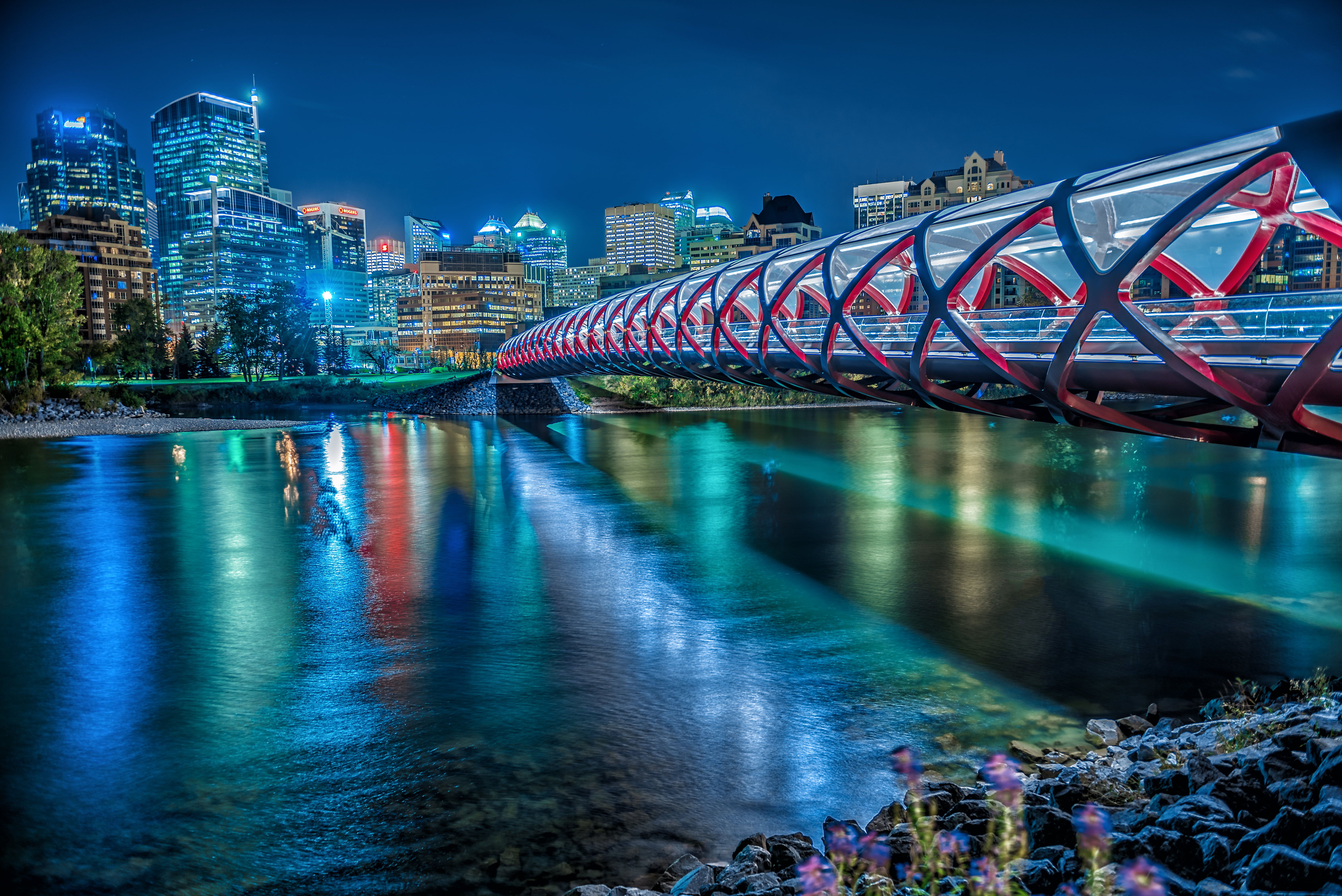 Time lapsed photography of bridge with river, peace bridge