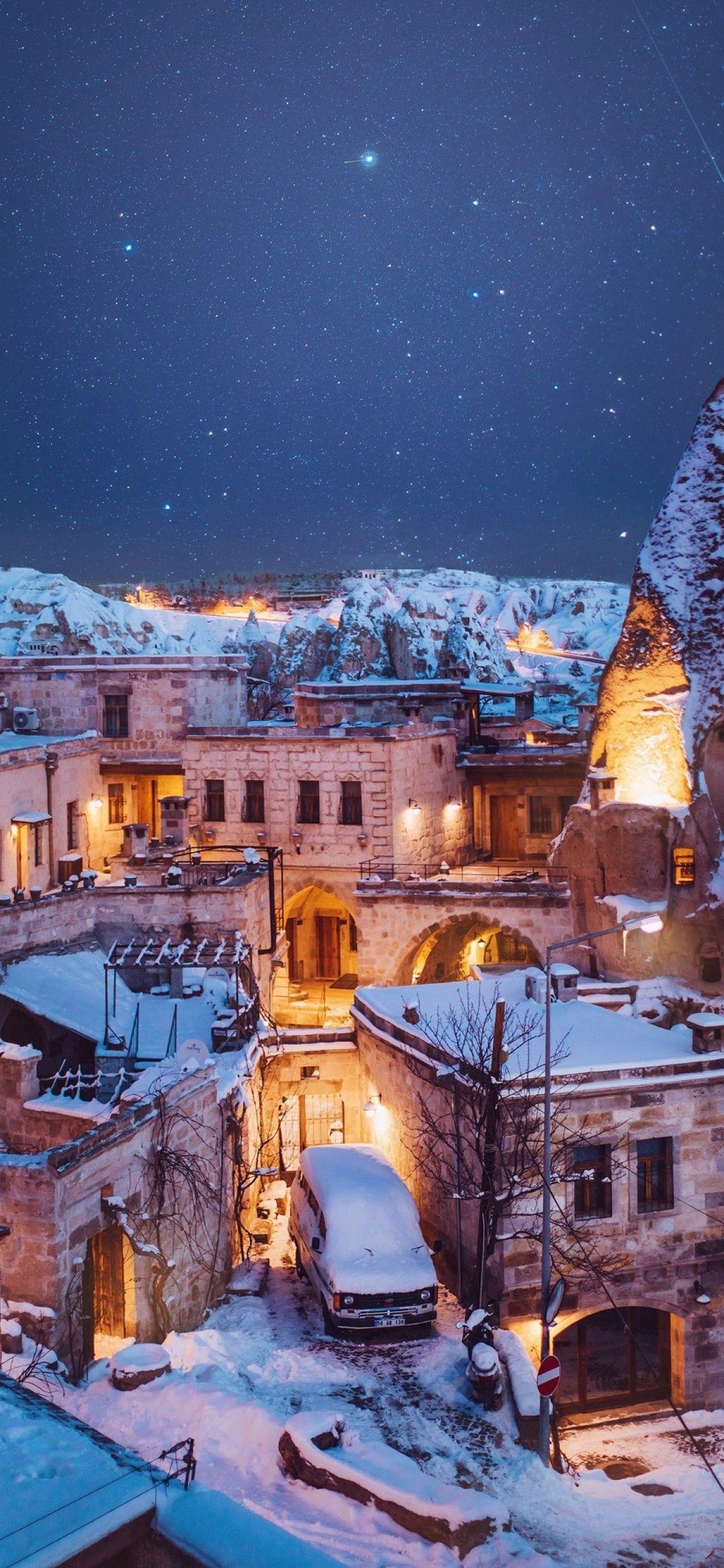 Download 1125x2436 Turkey, Cappadocia, Snow, Scenic, Winter