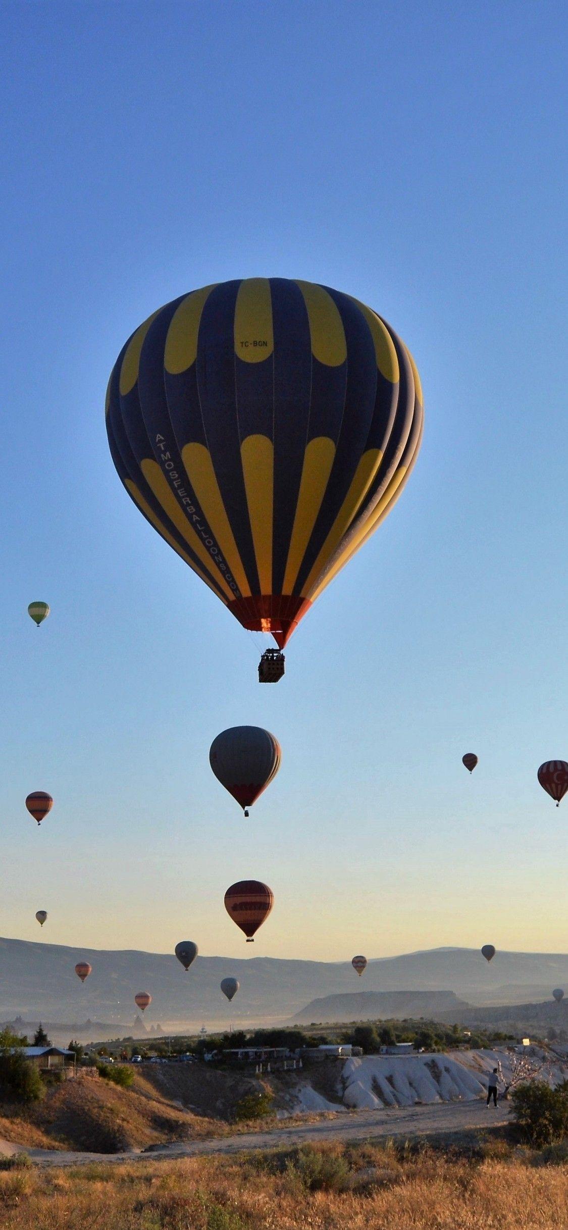 Download 1125x2436 Cappadocia, Turkey, Clean Sky, Balloons