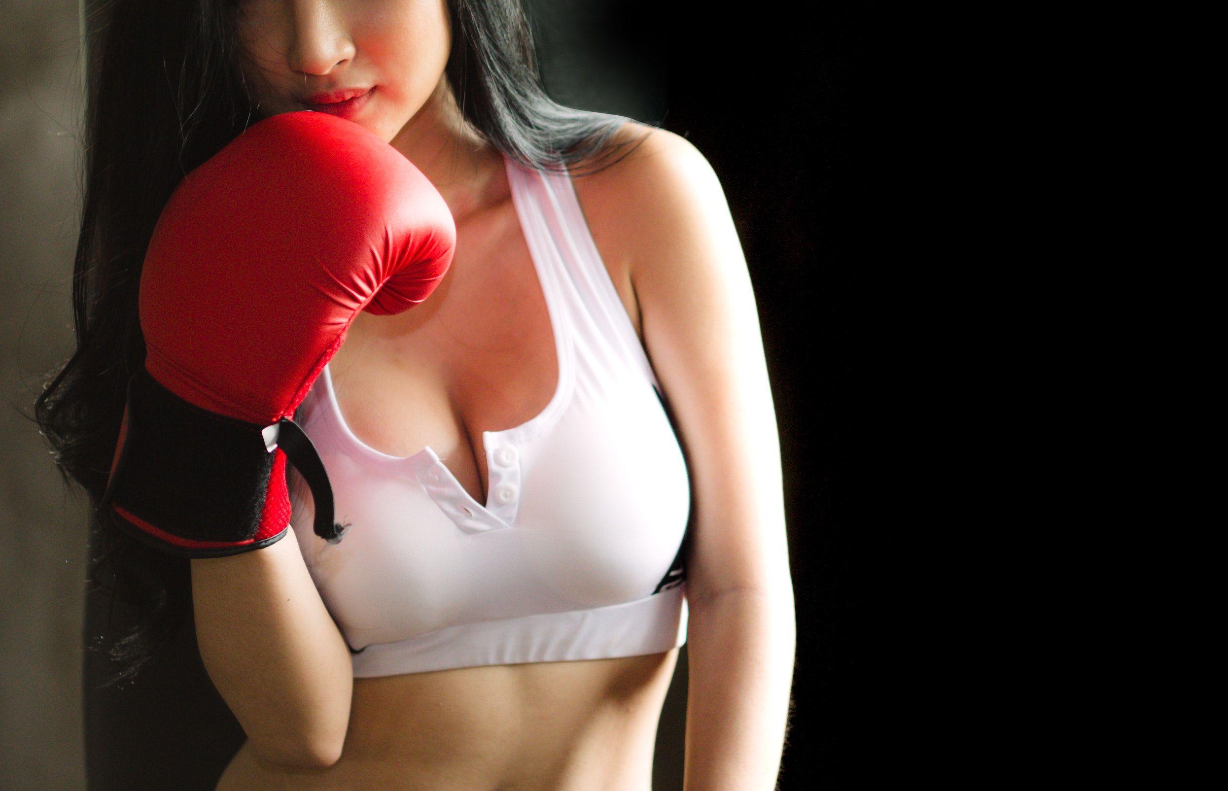 Woman in White Sports Bra and Red Boxing Glove - Free Stock Photo.
