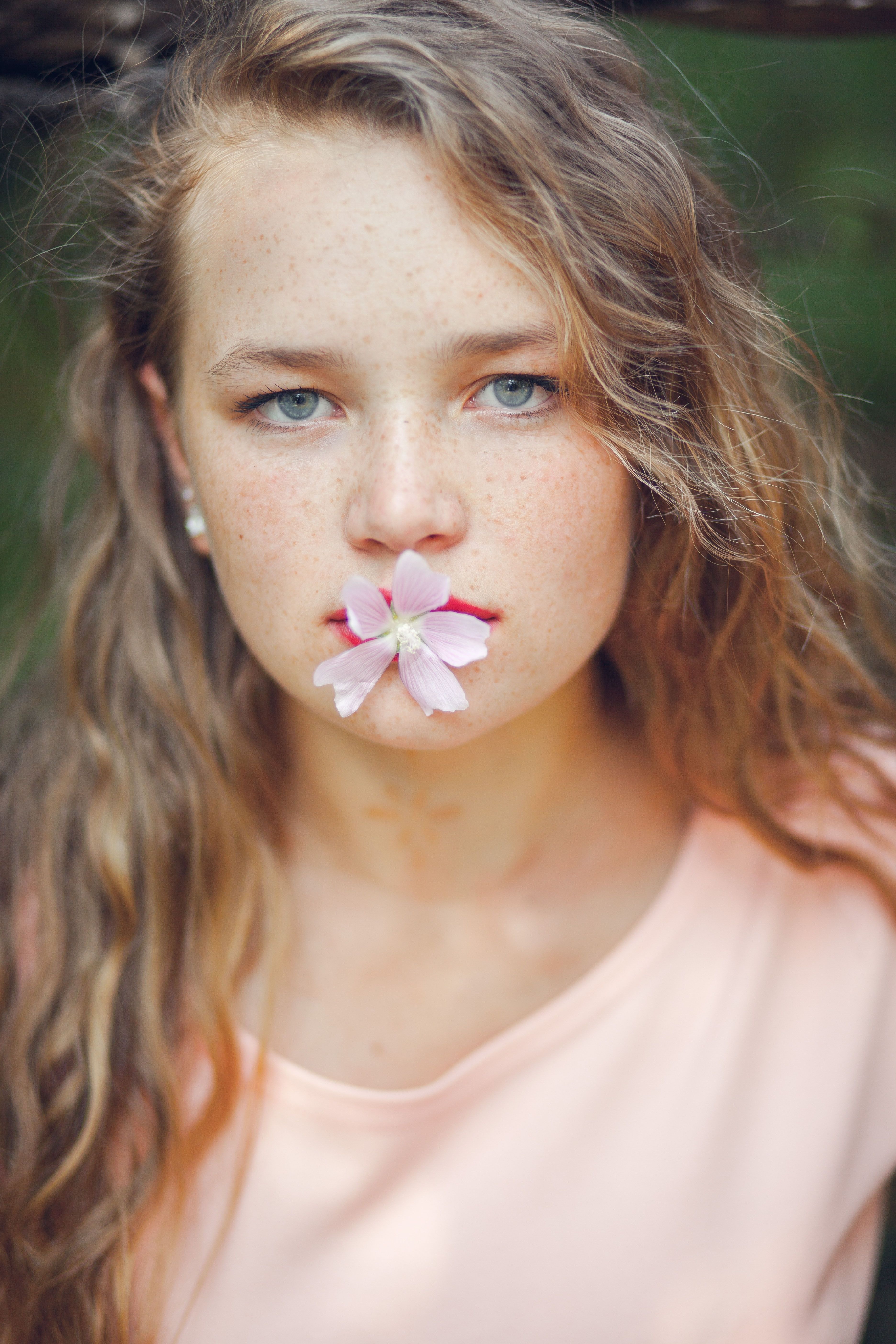 Download 3744x5616 Woman, Pink Flower, Model, Freckles, Earring