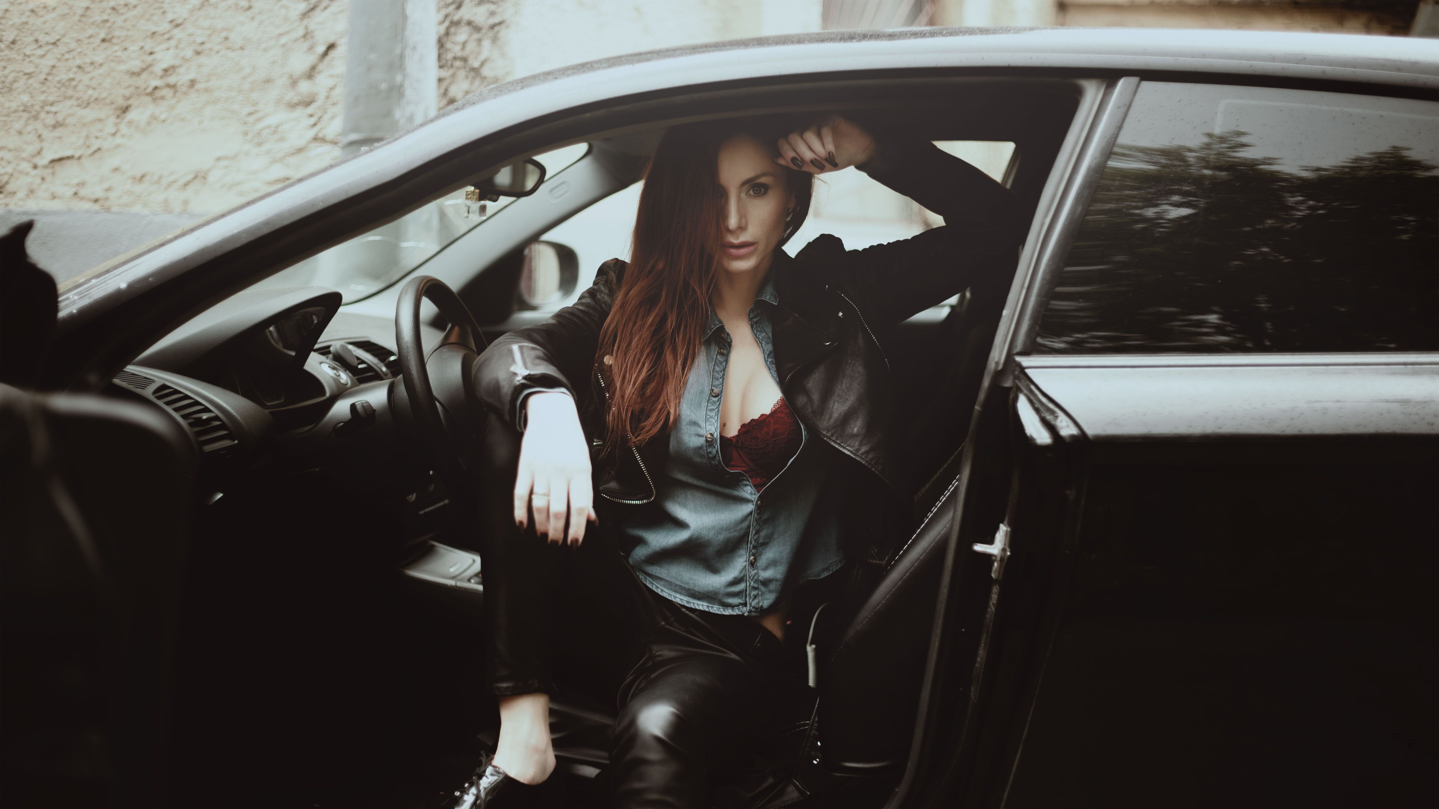 Woman wearing black leather jacket in car HD wallpaper. Wallpaper