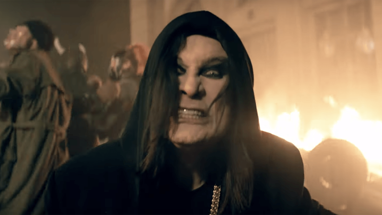 See Ozzy Osbourne Sing Amid Riots in New Straight to Hell Video