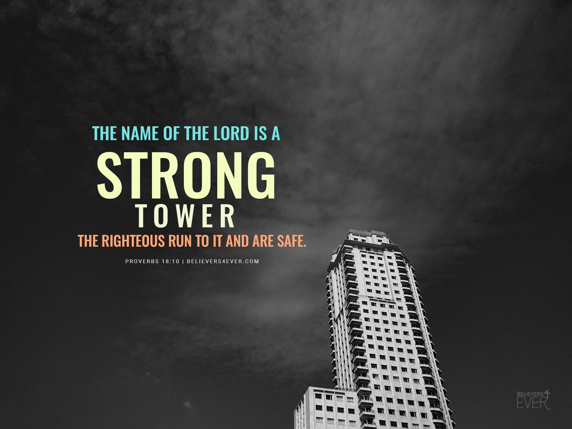 The name of the Lord is a strong tower. Free christian wallpaper