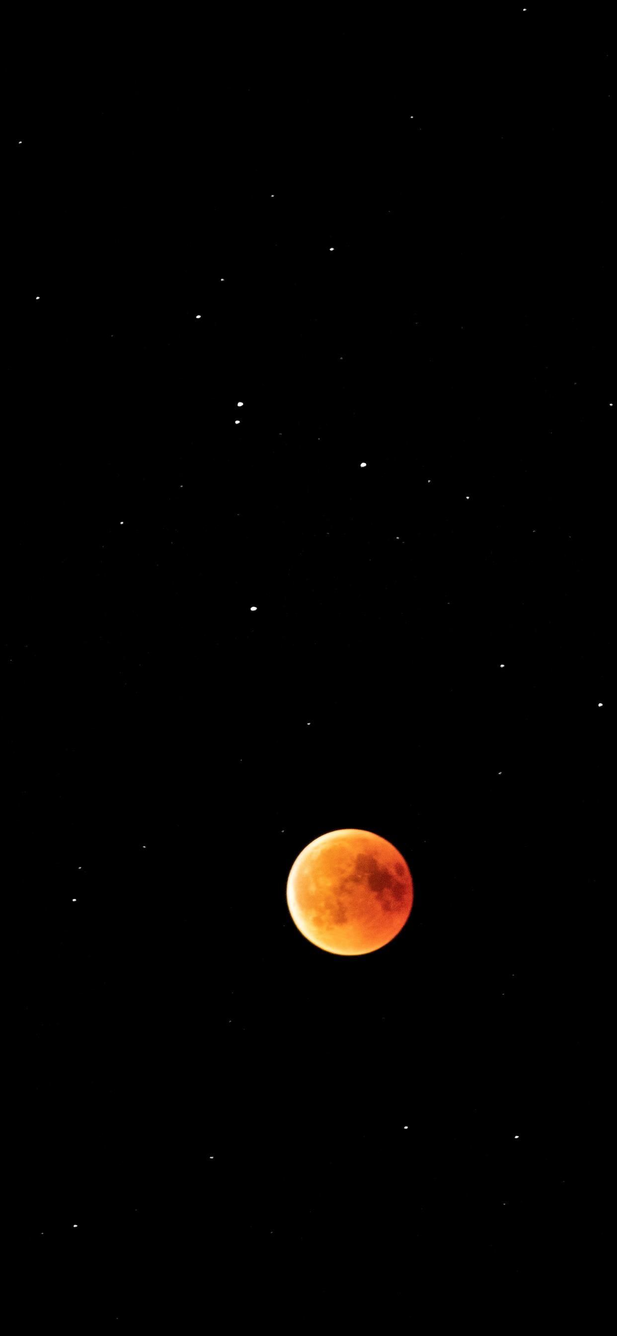 Lunar eclipse within the stars iPhone Wallpaper Free Download