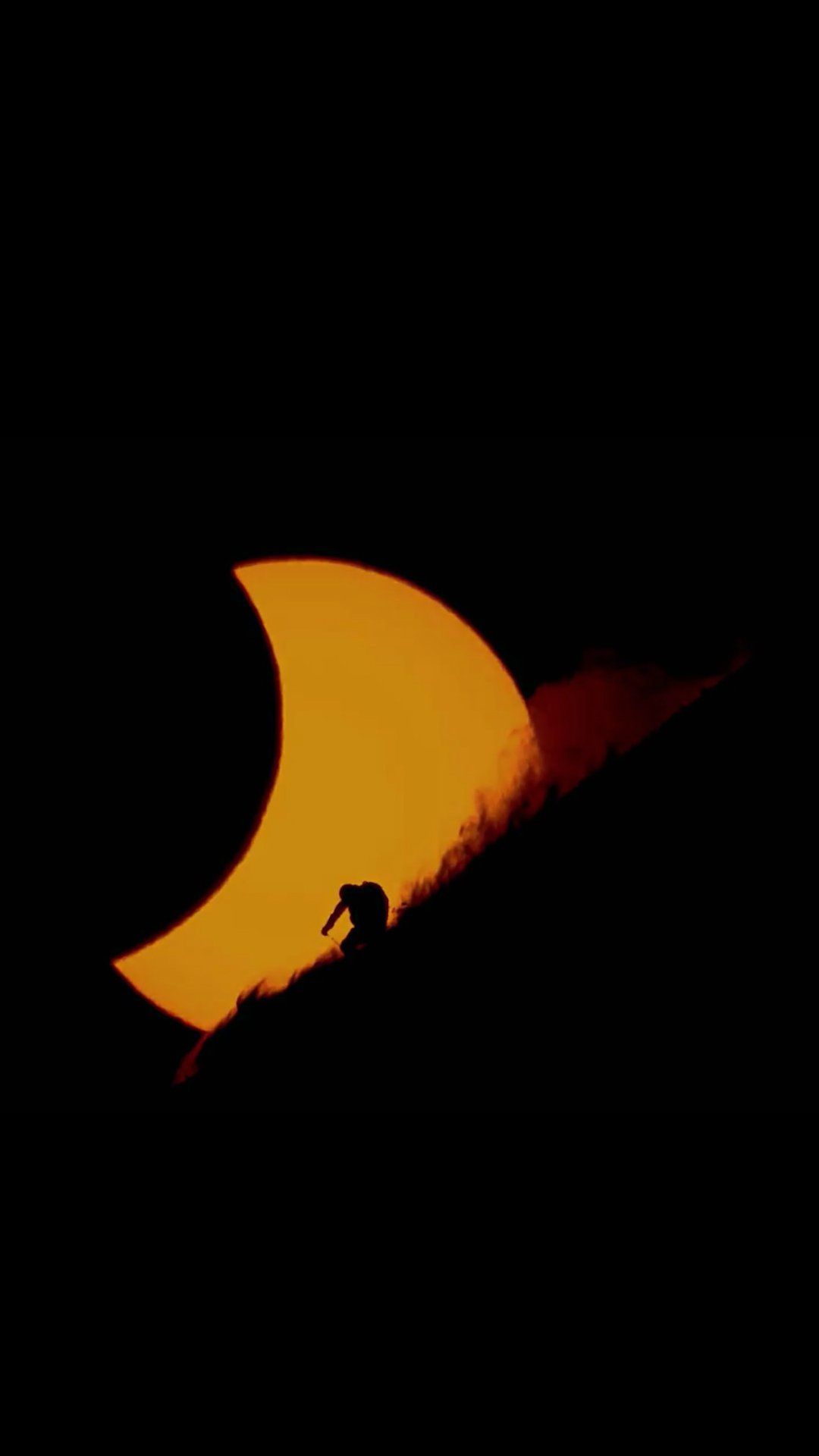 iPhone 6 wallpaper Ski shot during a solar eclipse credit