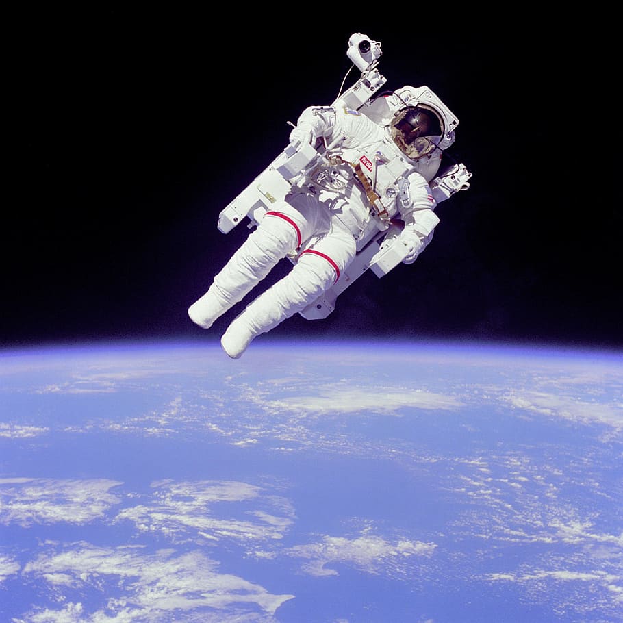 HD wallpaper: photo of astronaut floating above earth, weightless