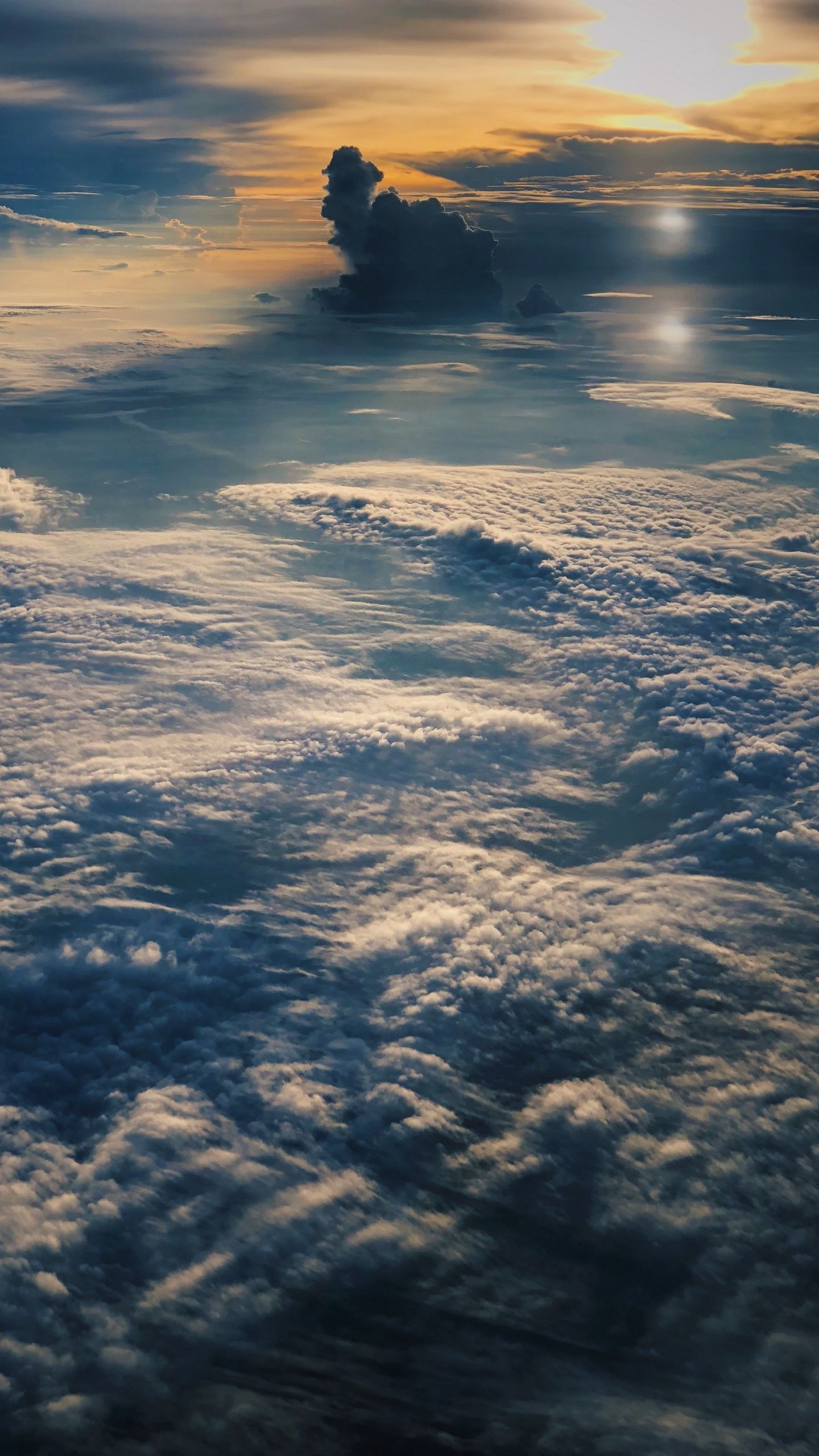 Download wallpaper 1440x2560 clouds, above clouds, high, flight
