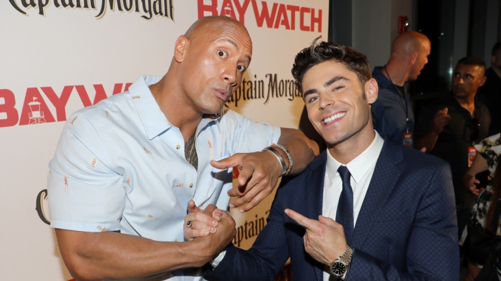 EXCLUSIVE: Dwayne Johnson Reveals What It's Like to Kiss Zac Efron