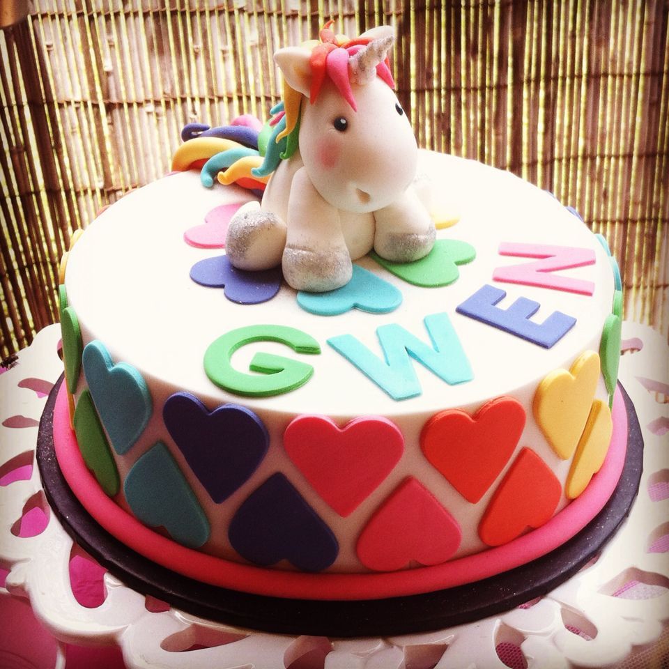 Unicorn and Rainbows year old girls birthday cake