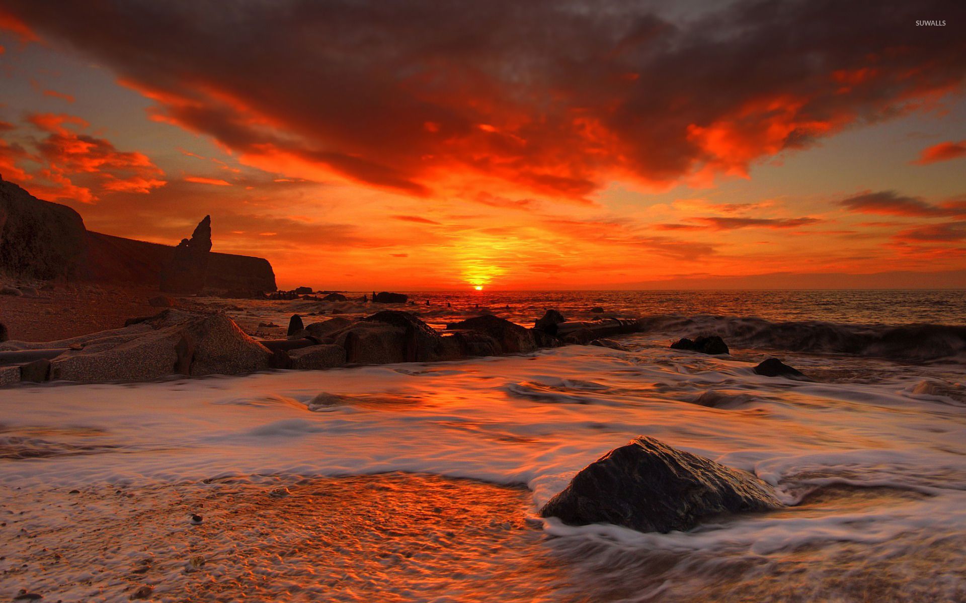 Red sunset above the rocky beach wallpaper wallpaper