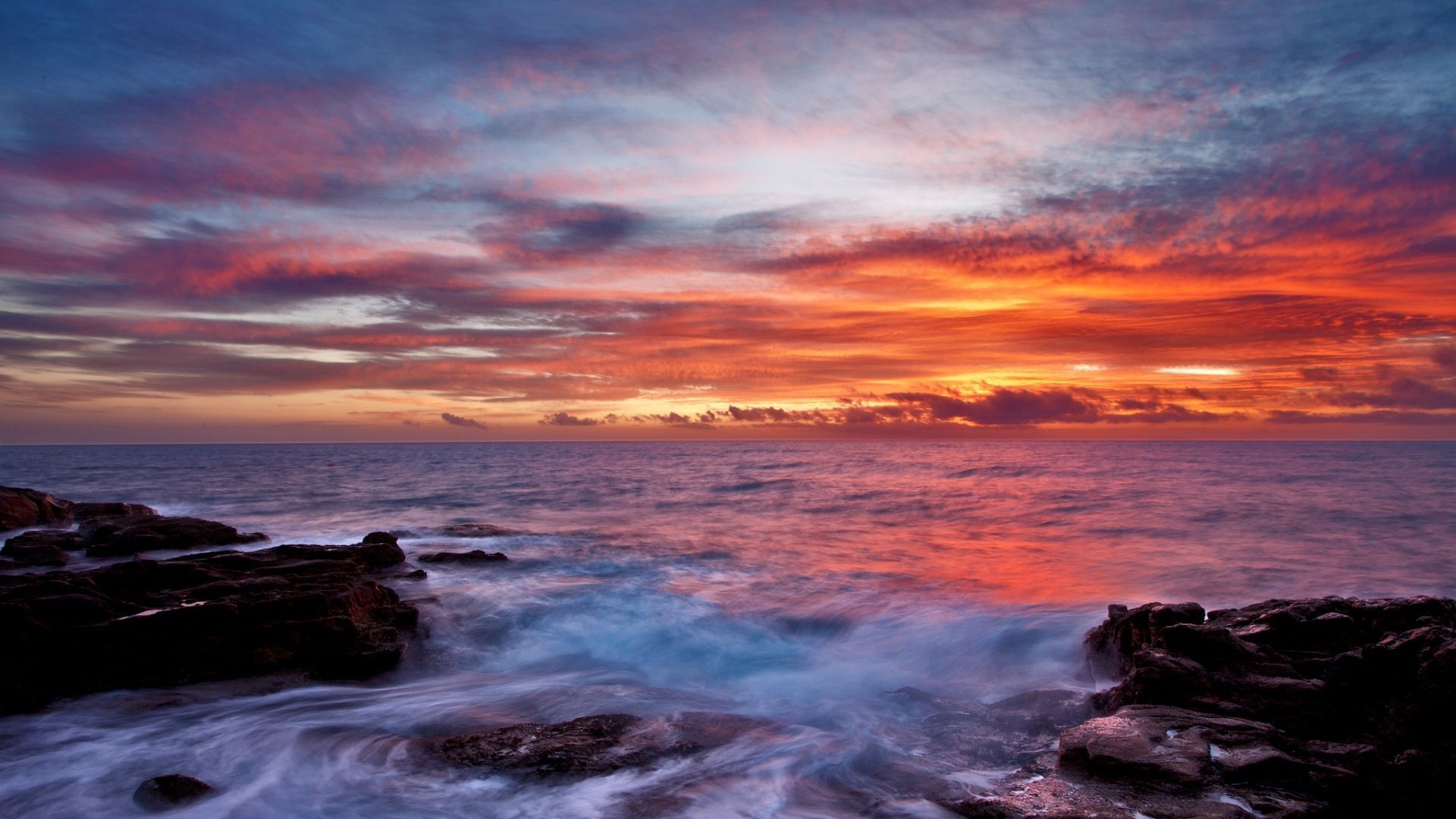 Download Wallpaper 1920x1080 Sea, Sky, Sunset, Clouds, Rocks, Surf