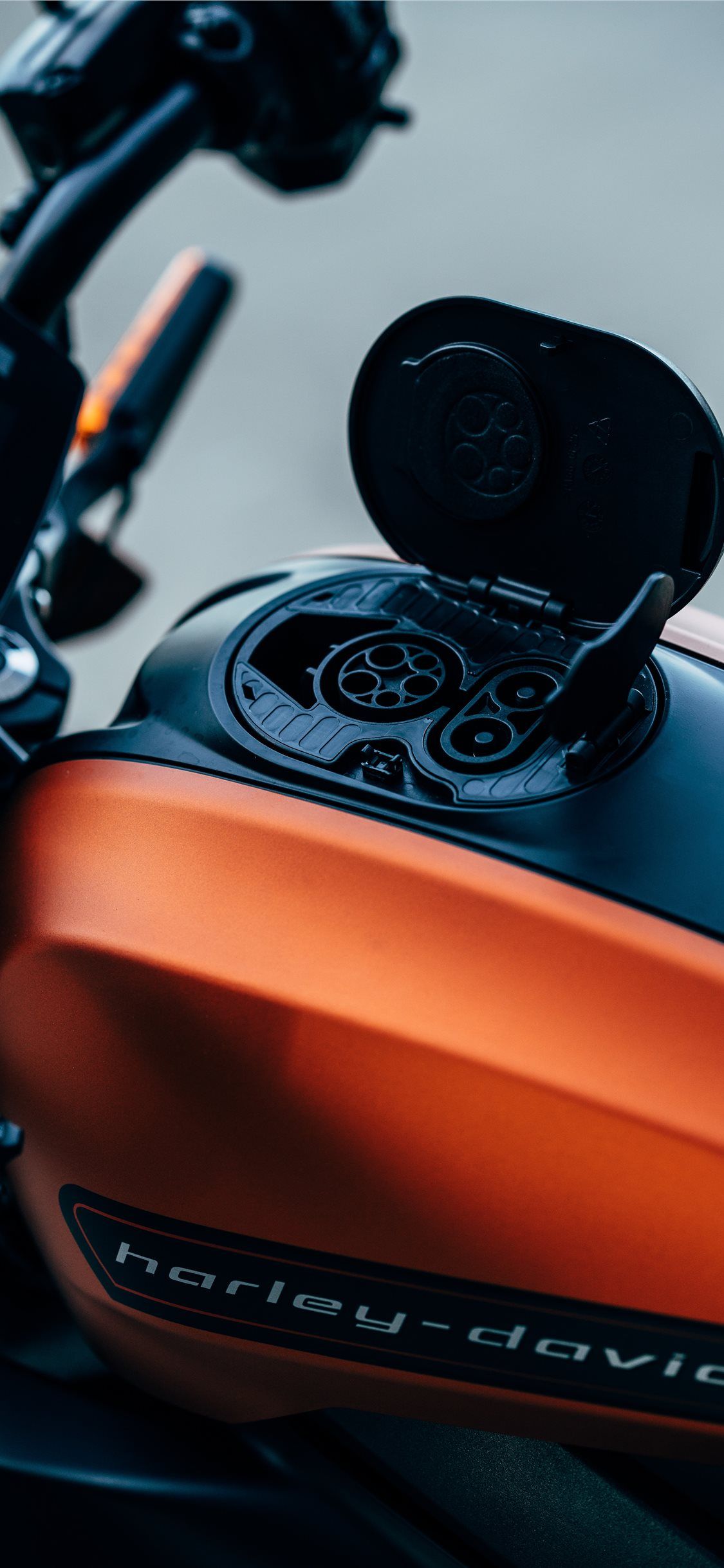 orange and black Harley Davidson motorcycle iPhone X Wallpaper Free Download