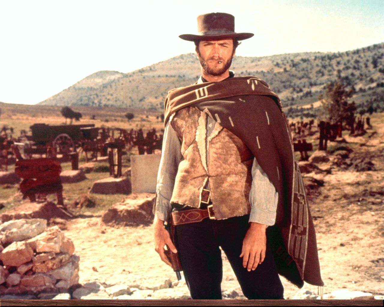 Clint Eastwood in A Fistful of Dollars. Clint eastwood, Western