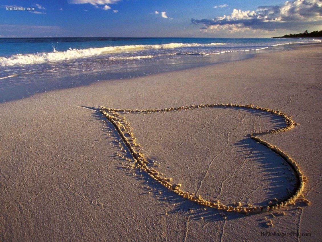 Heart on the sand at the beach