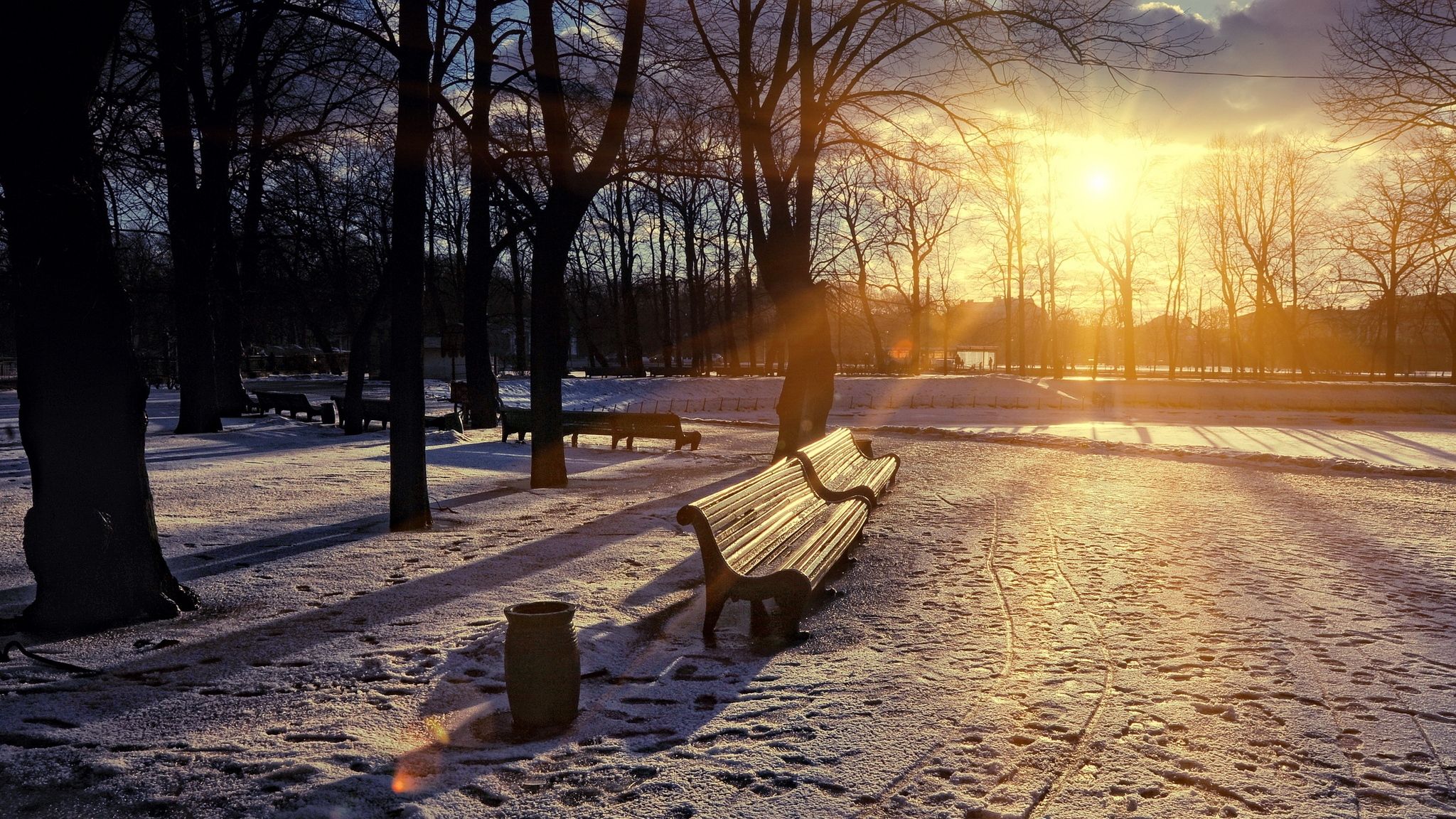 Download wallpaper 2048x1152 winter, park, sunset, bench, snow
