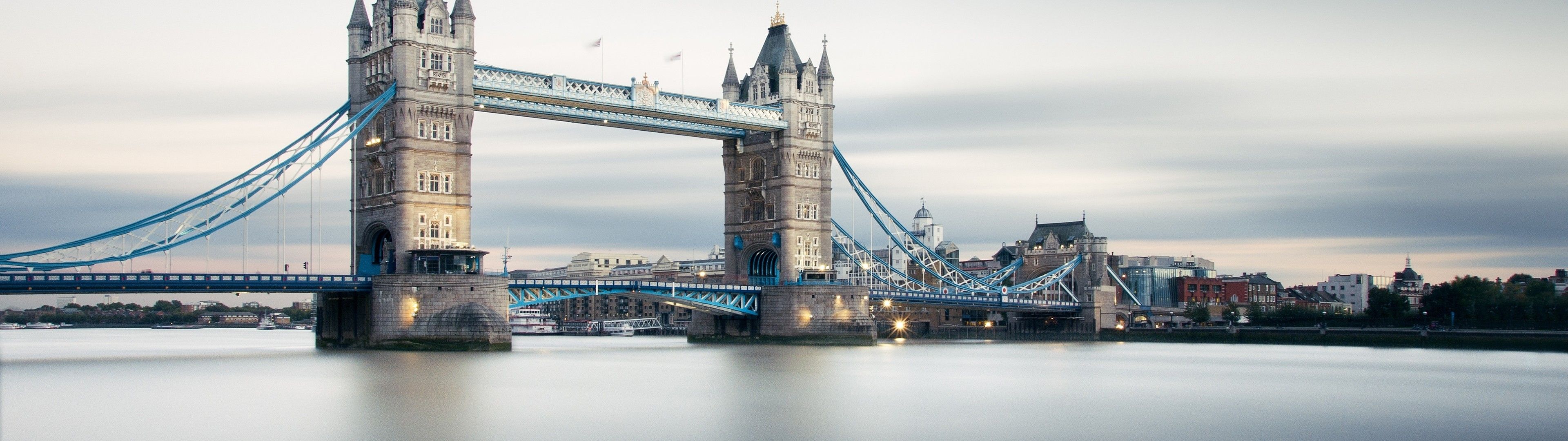 Download 3840x1080 London Bridge, River, Cloudy Weather Wallpaper