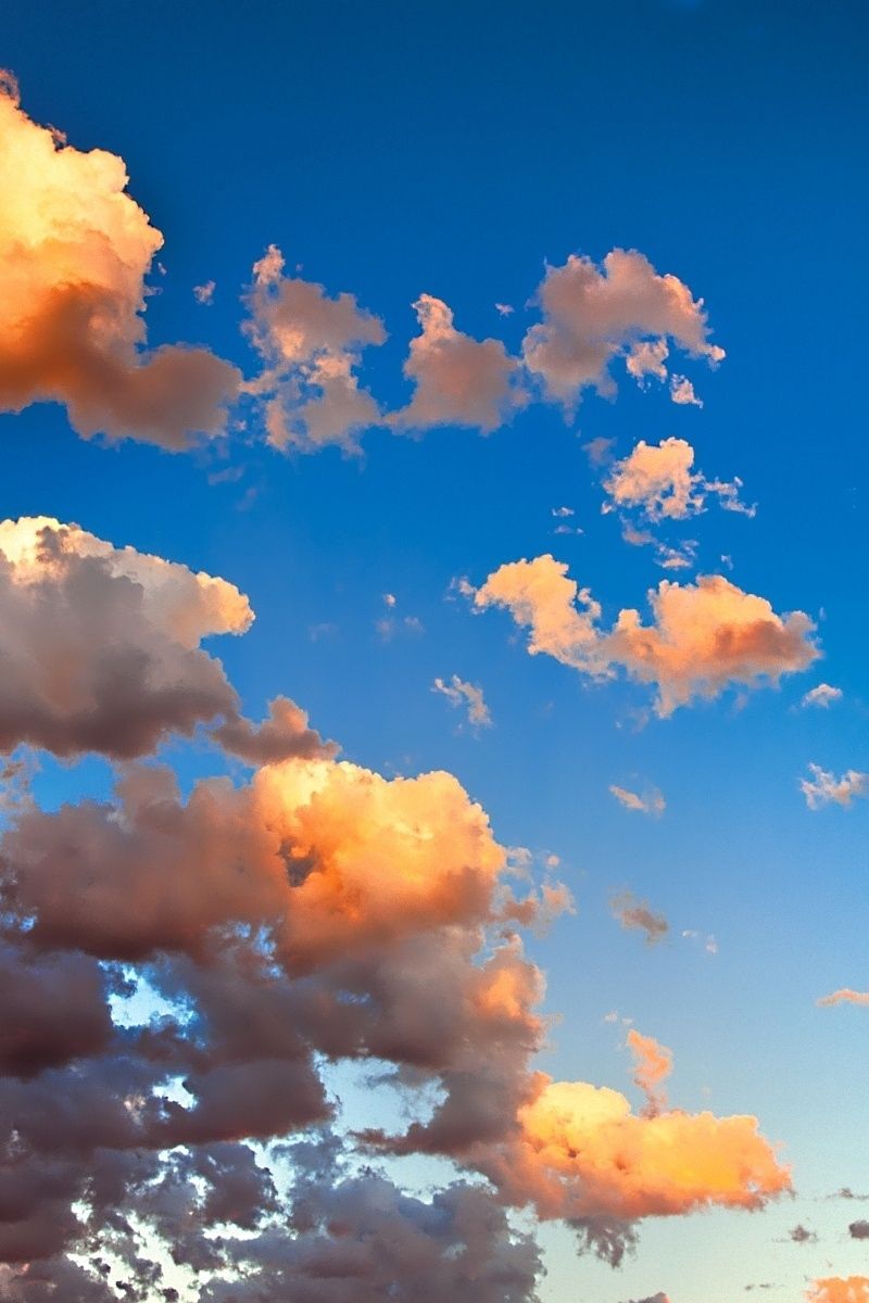 Download wallpaper 800x1200 clouds, colors, sky, gold, air, ease