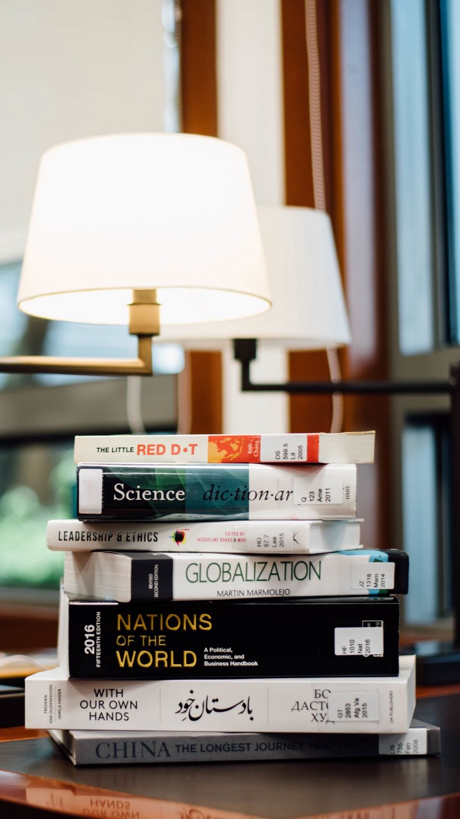 Download Wallpaper 938x1668 Books, Table, Lamp Iphone 8 7 6s 6