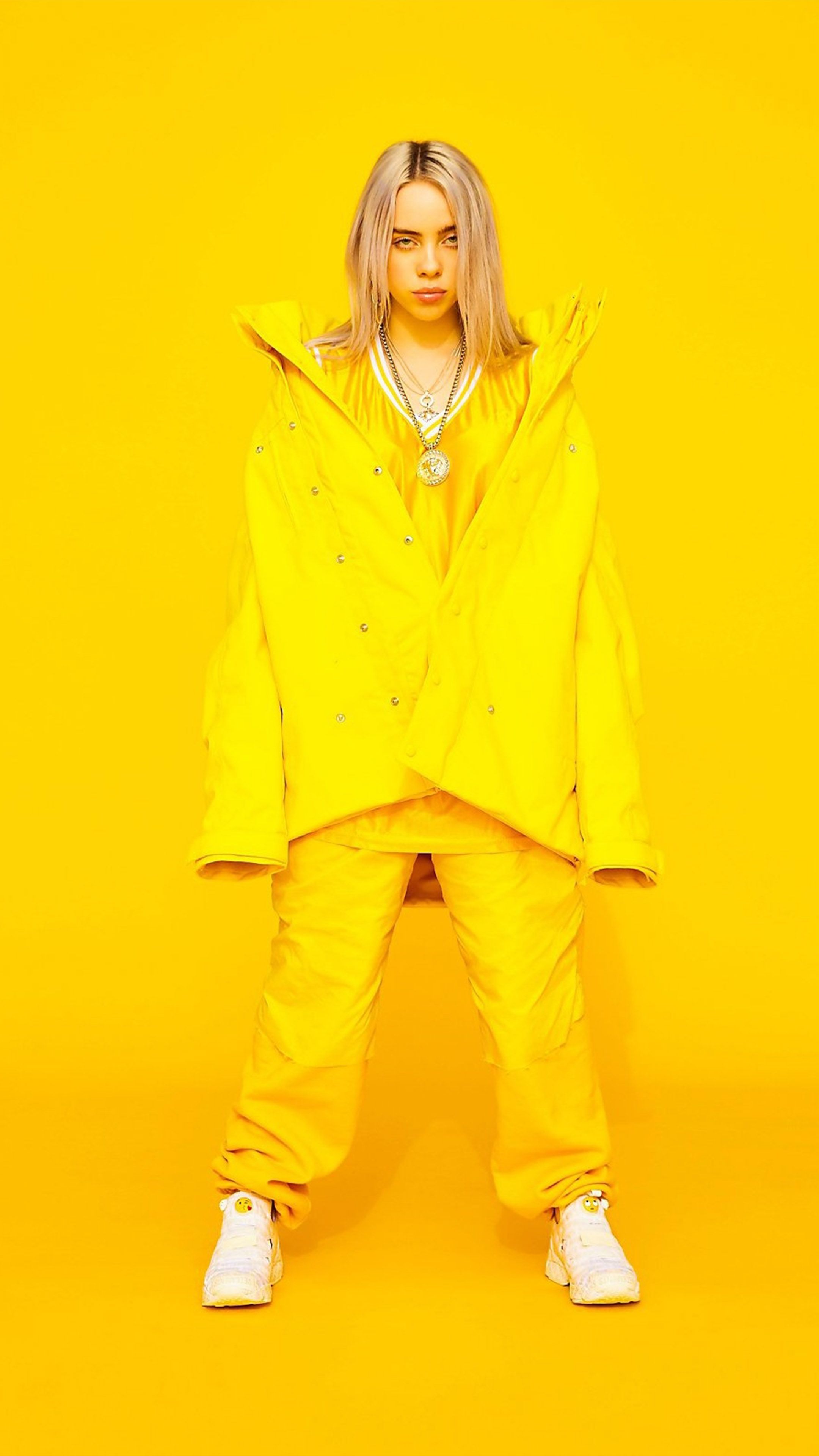 Billie Eilish Yellow Background Free 4K Ultra HD Mobile Wallpaper