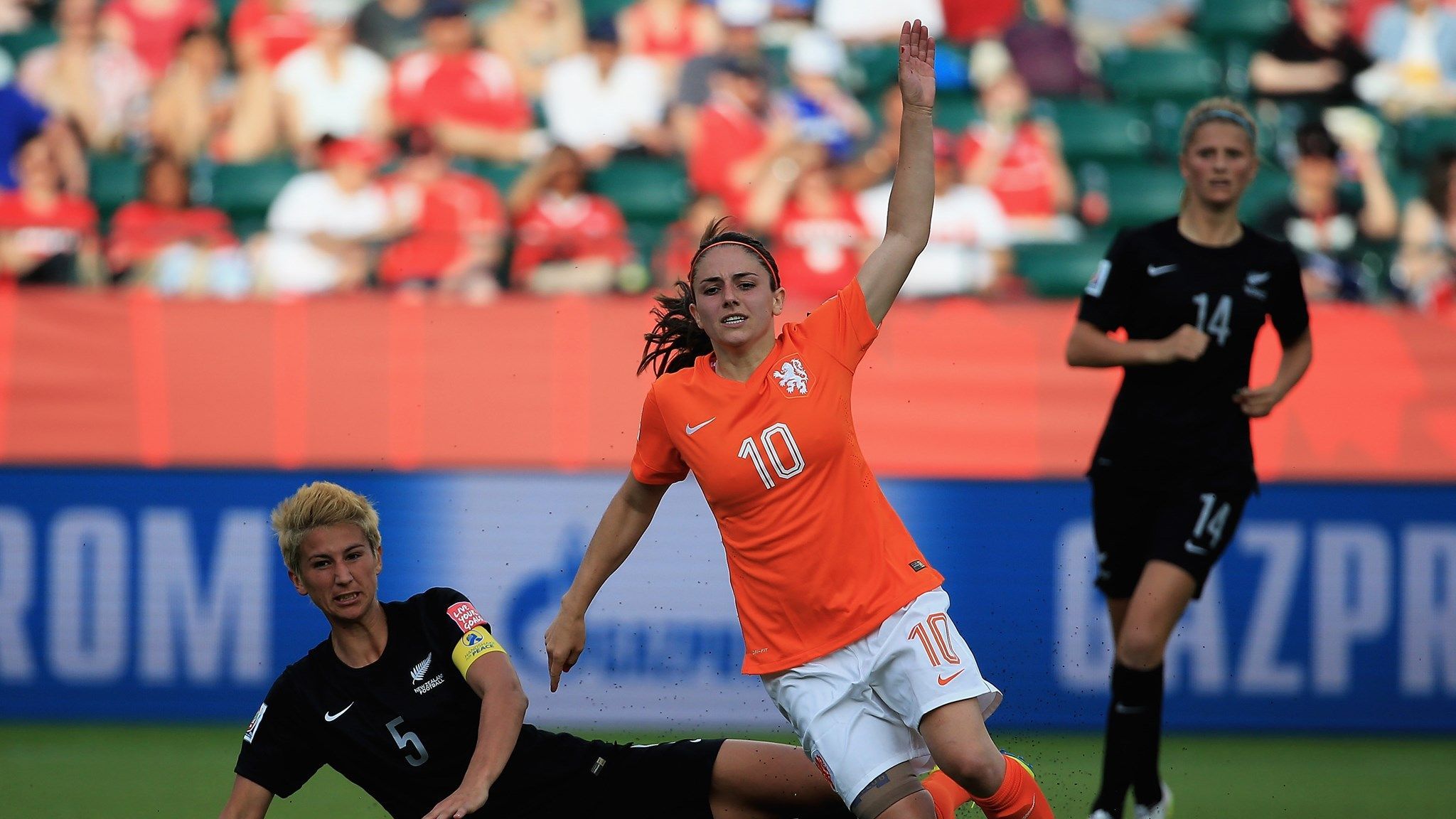 Abby Erceg of New Zealand tackles Danielle Van de Donk