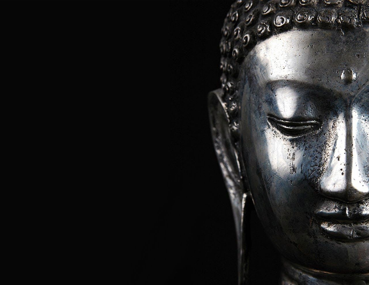 Brass Buddha Figurine on Black Surface · Free Stock Photo