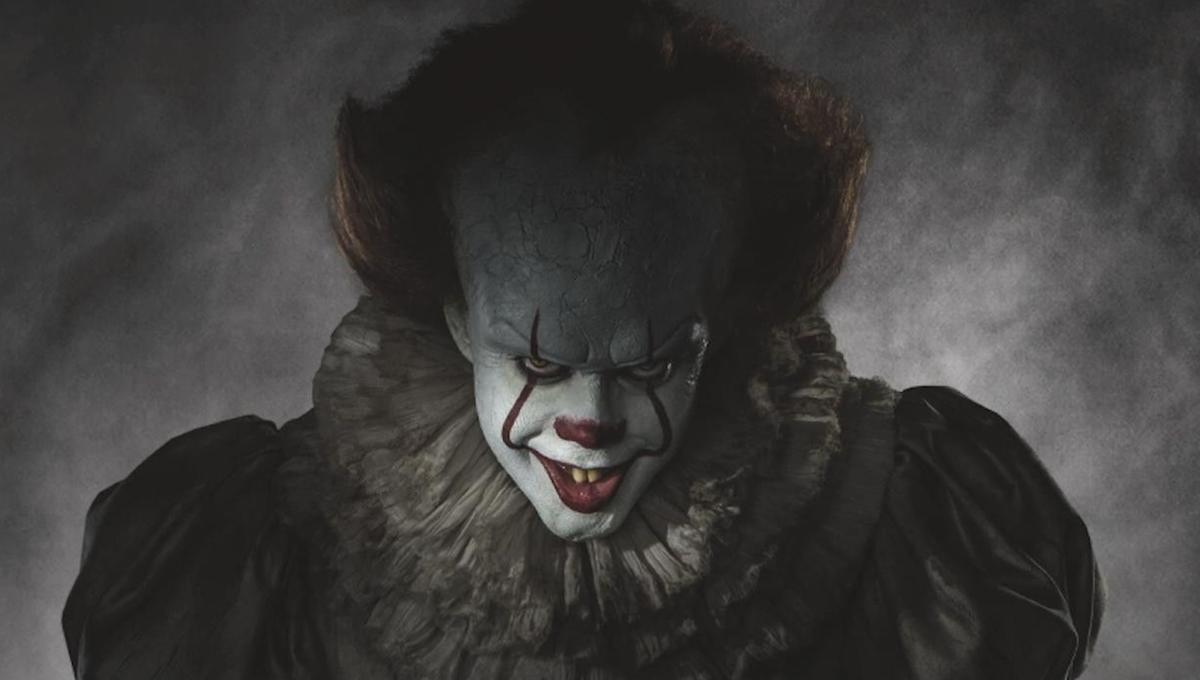 Pennywise's evil grin on an IT Chapter Two billboard made parents