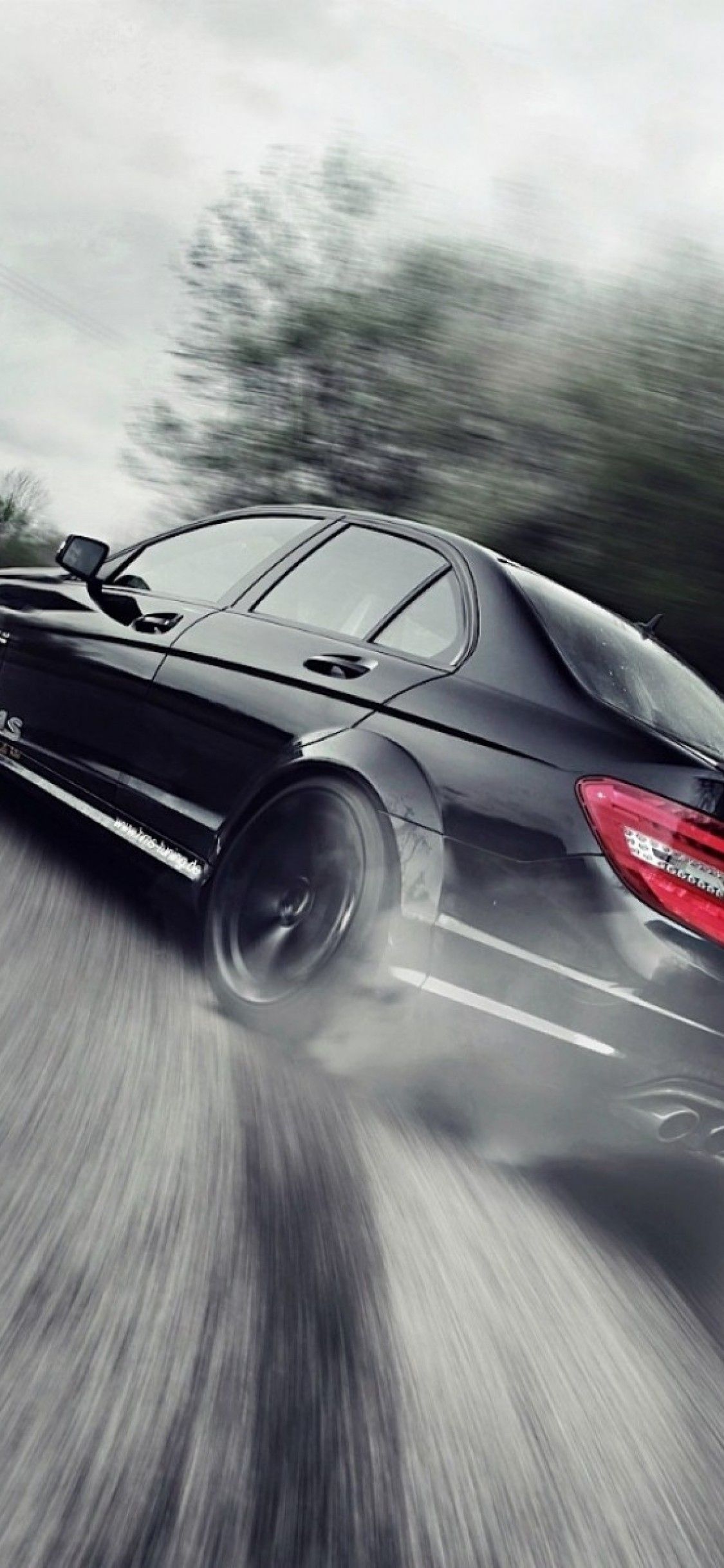 Download 1125x2436 Mercedes Benz C Class C Black, Drift, Cars