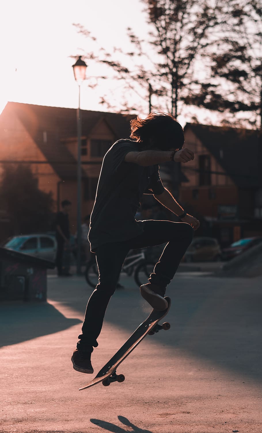 HD wallpaper: man doing skateboard trick during daytime