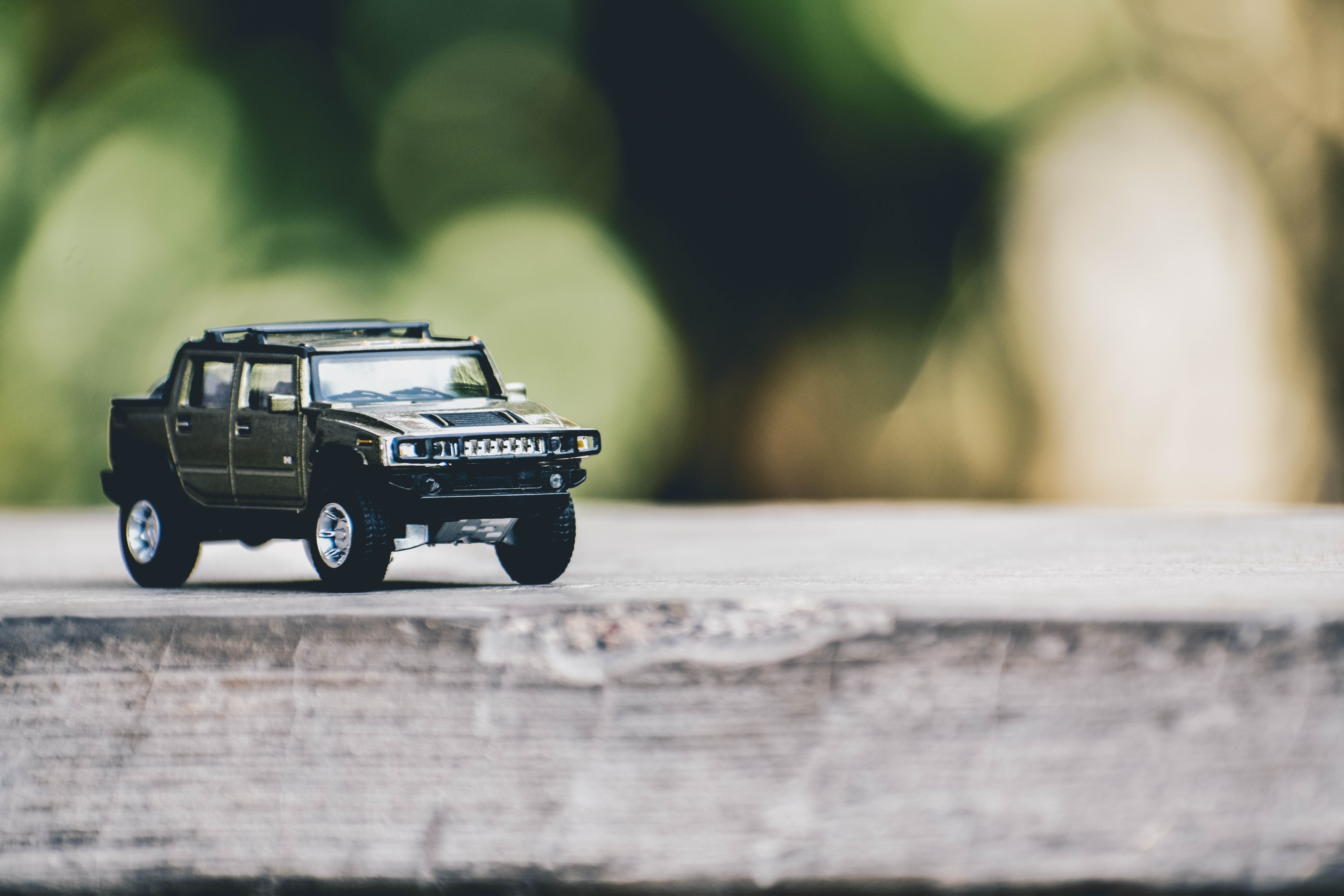 Selective Focus Photography of Gray Hummer Truck Miniature · Free