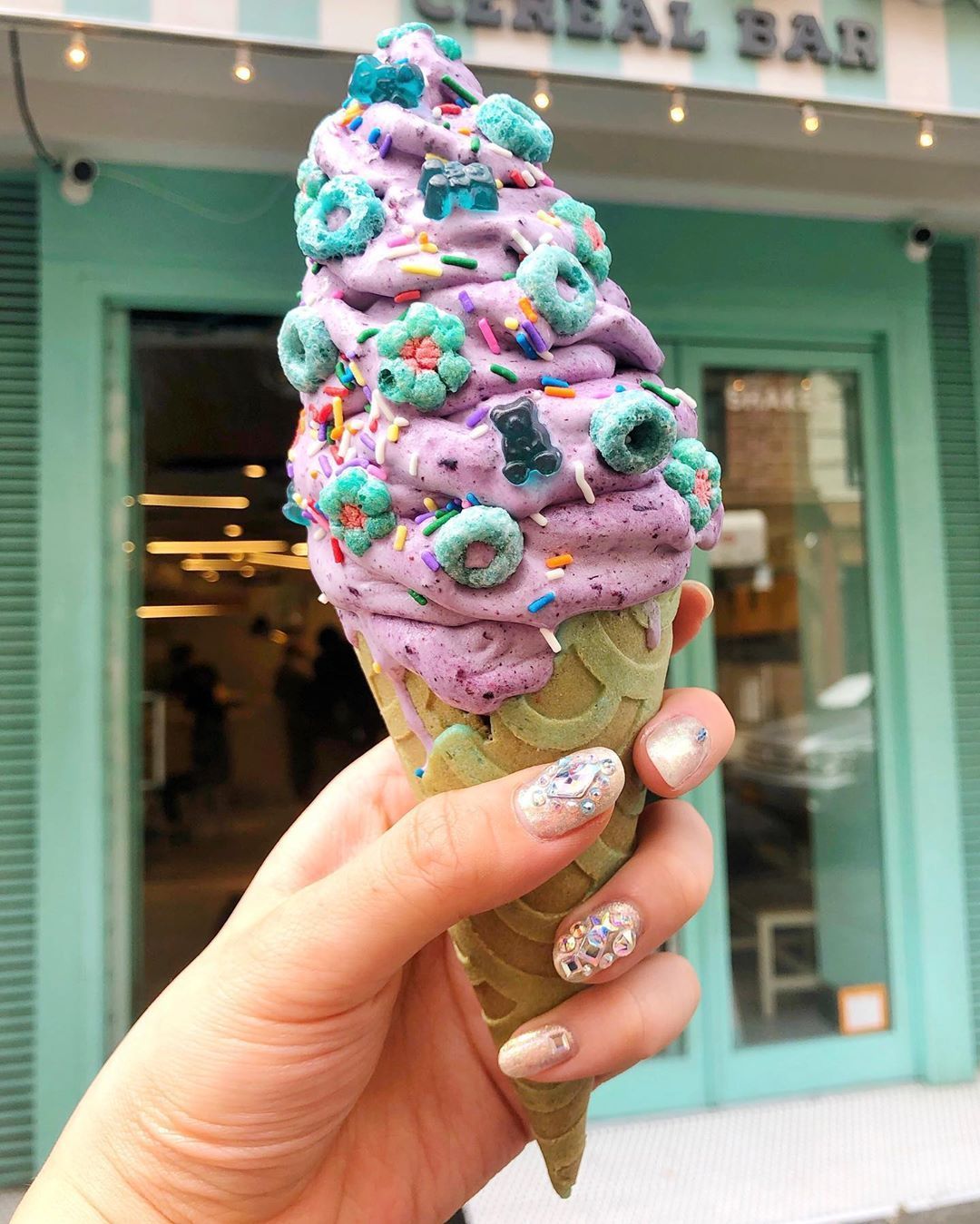 Blueberry Ice Cream on a Fruity Pebble Cone with Sprinkles, Froot