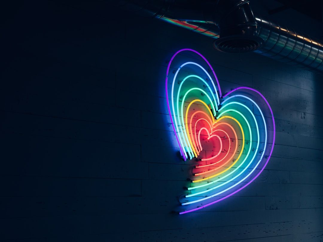 multicolored heart LED light on wall photo