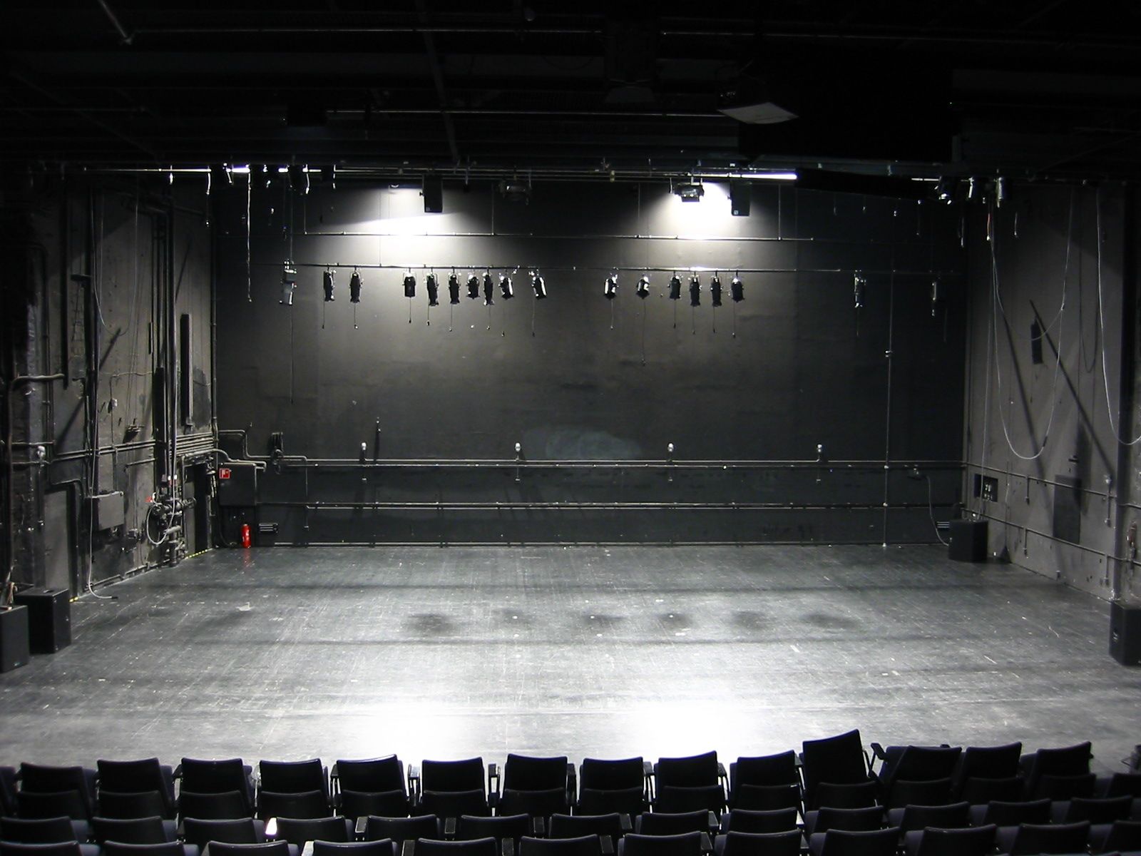 Theatre Stage With Spotlights.png