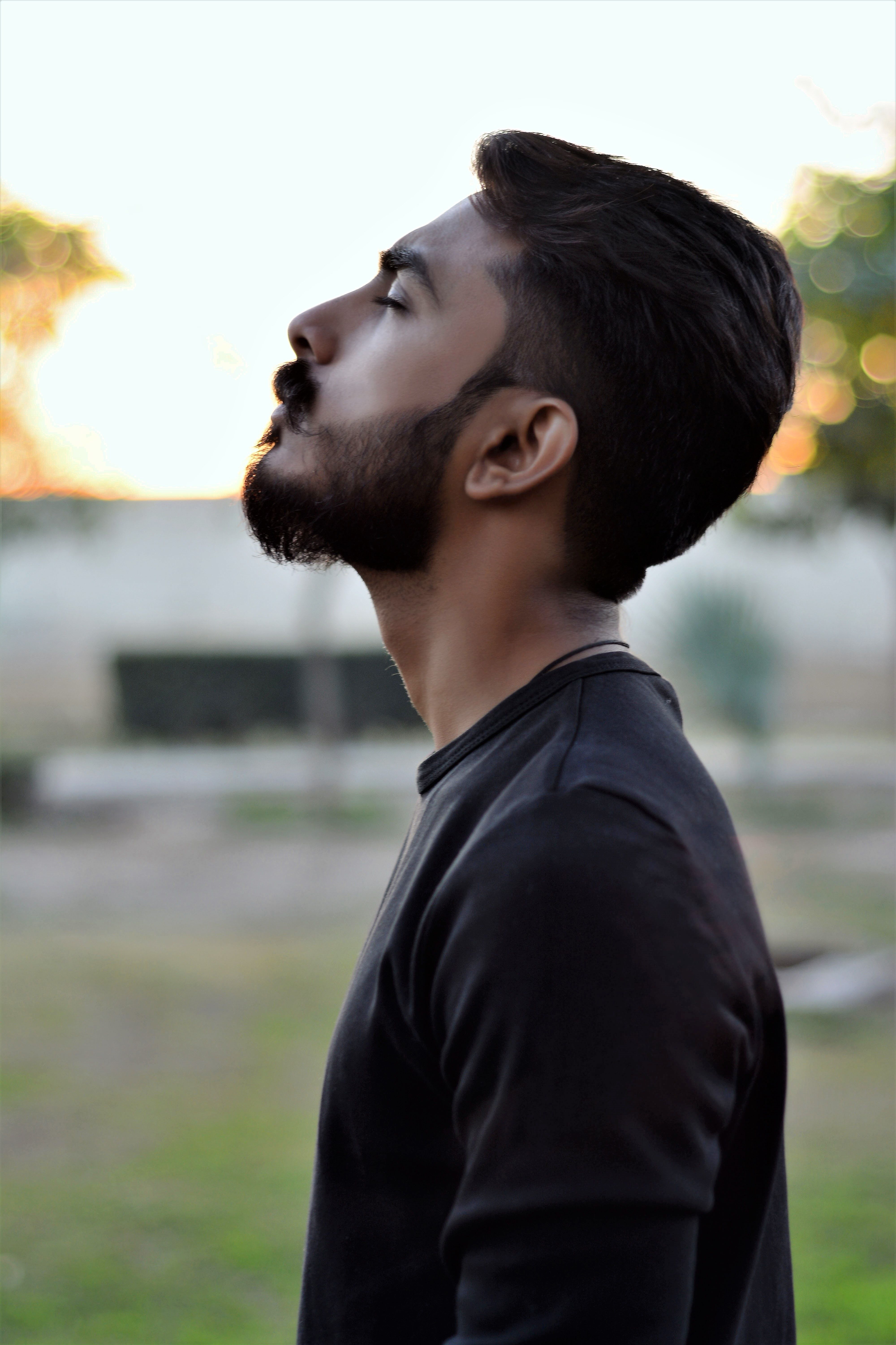Side View Photography of Man While Closing His Eyes · Free