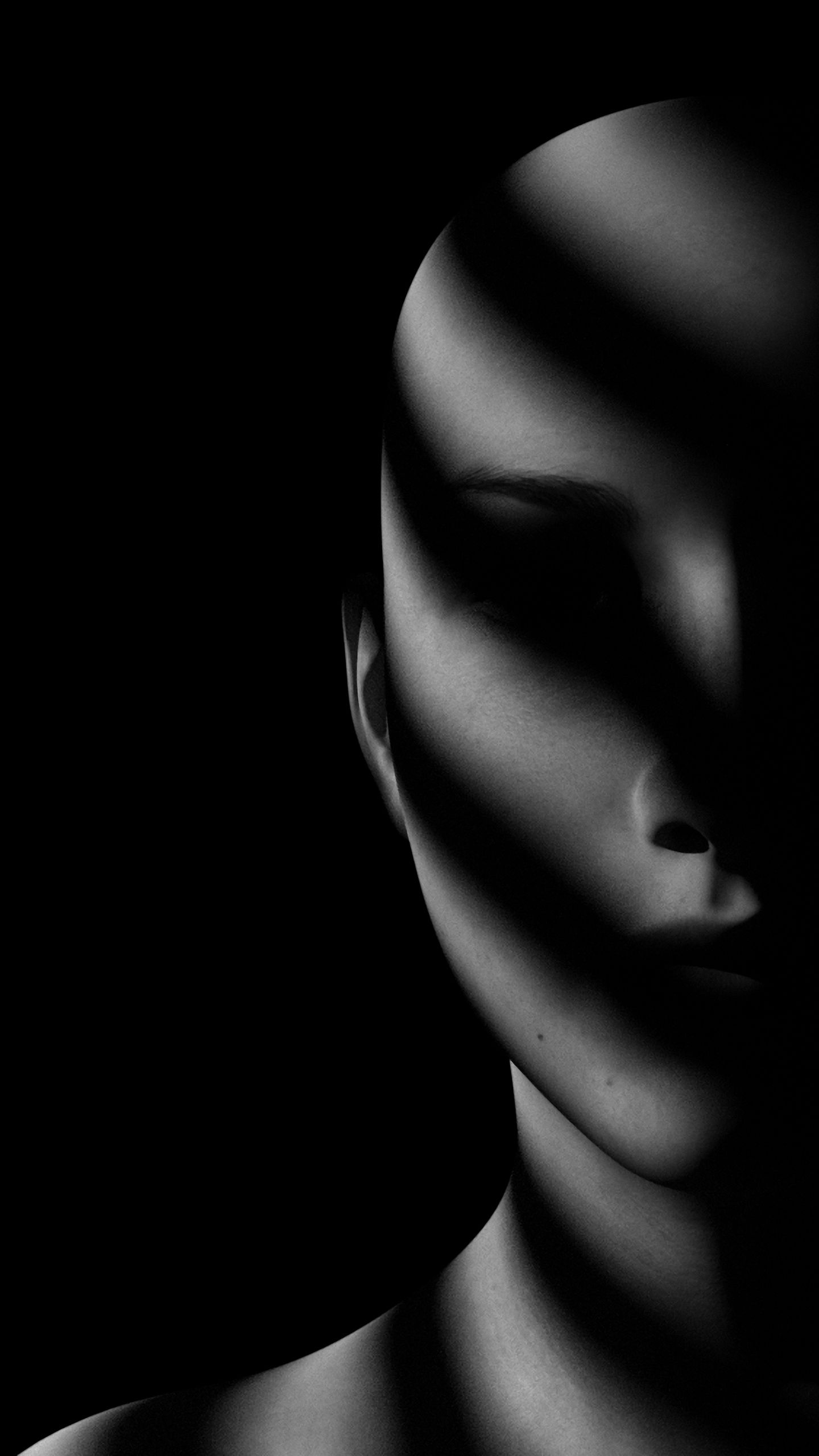 Download wallpaper 1440x2560 face, shadow, dark, bw, noir