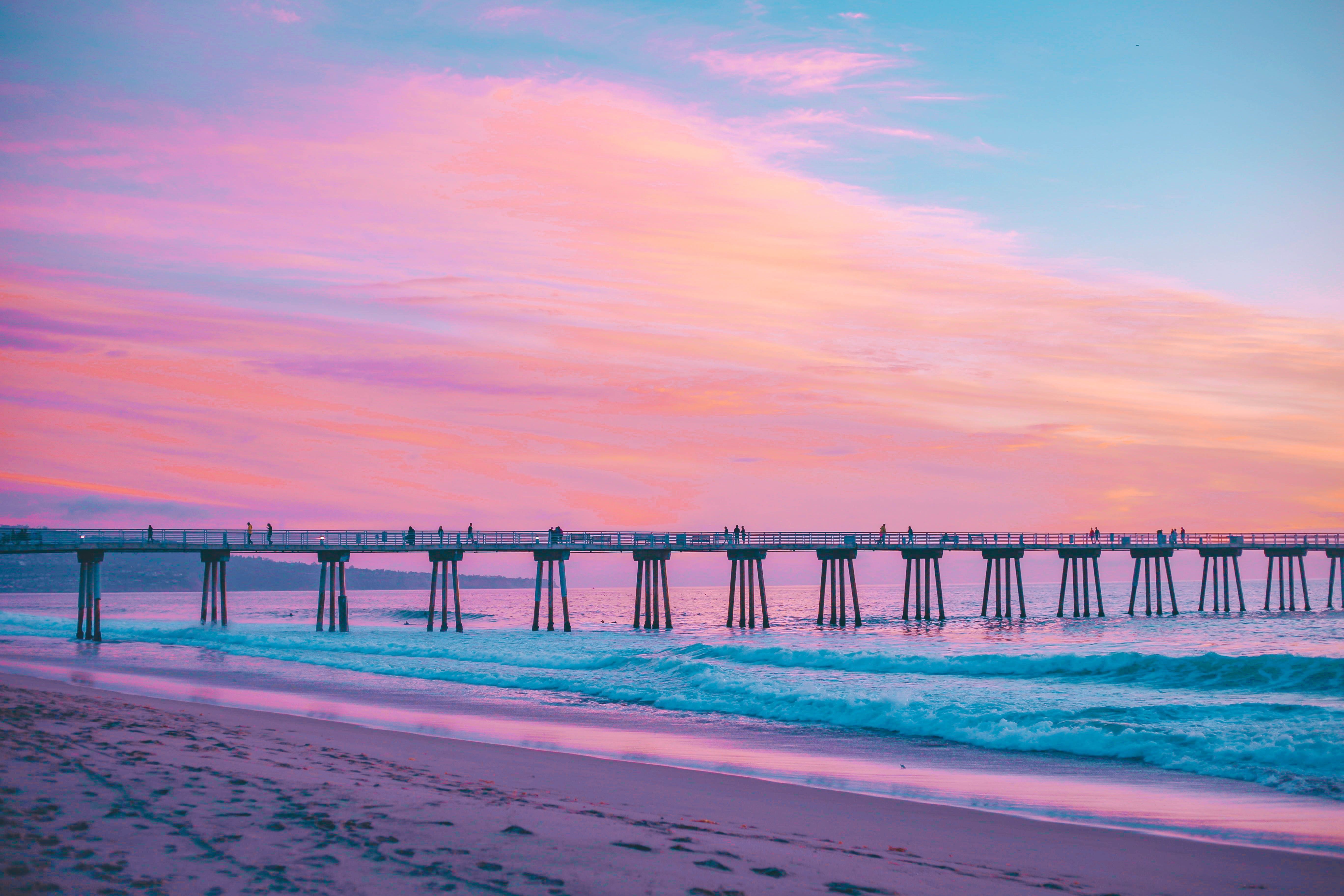 5472x3648 #sunrise, #wave, #sunset, #sea, #nature, #footprints, #blue, #water, #pastel, #pink, #californium, #pier, #sand, #ocean, #bridge, #Public domain image, #beach, #orange. Mocah.org HD Wallpaper