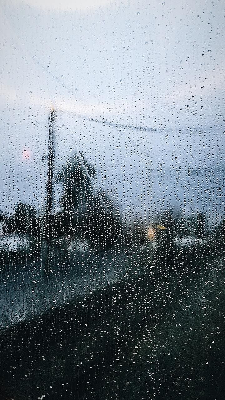 Rain On Window. Rainy Day In Traffic. Blue Gray Red Aesthetic