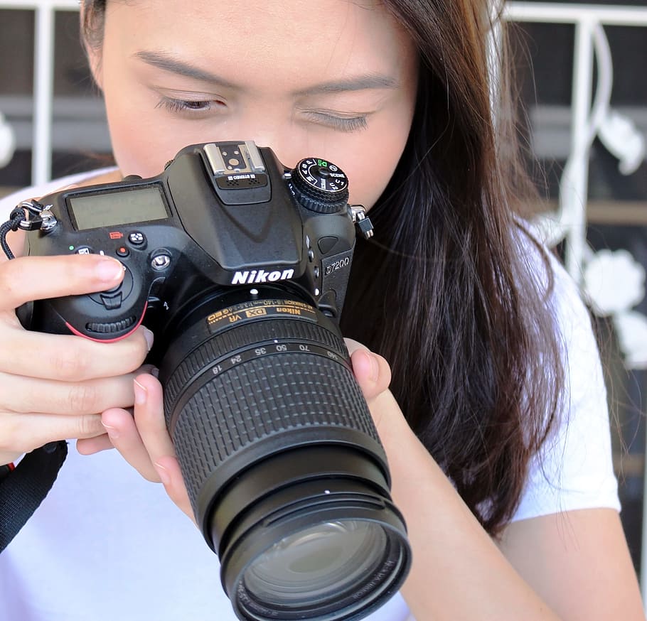 HD wallpaper: Asian girl takes photo with a Nikon D7200 DSLR