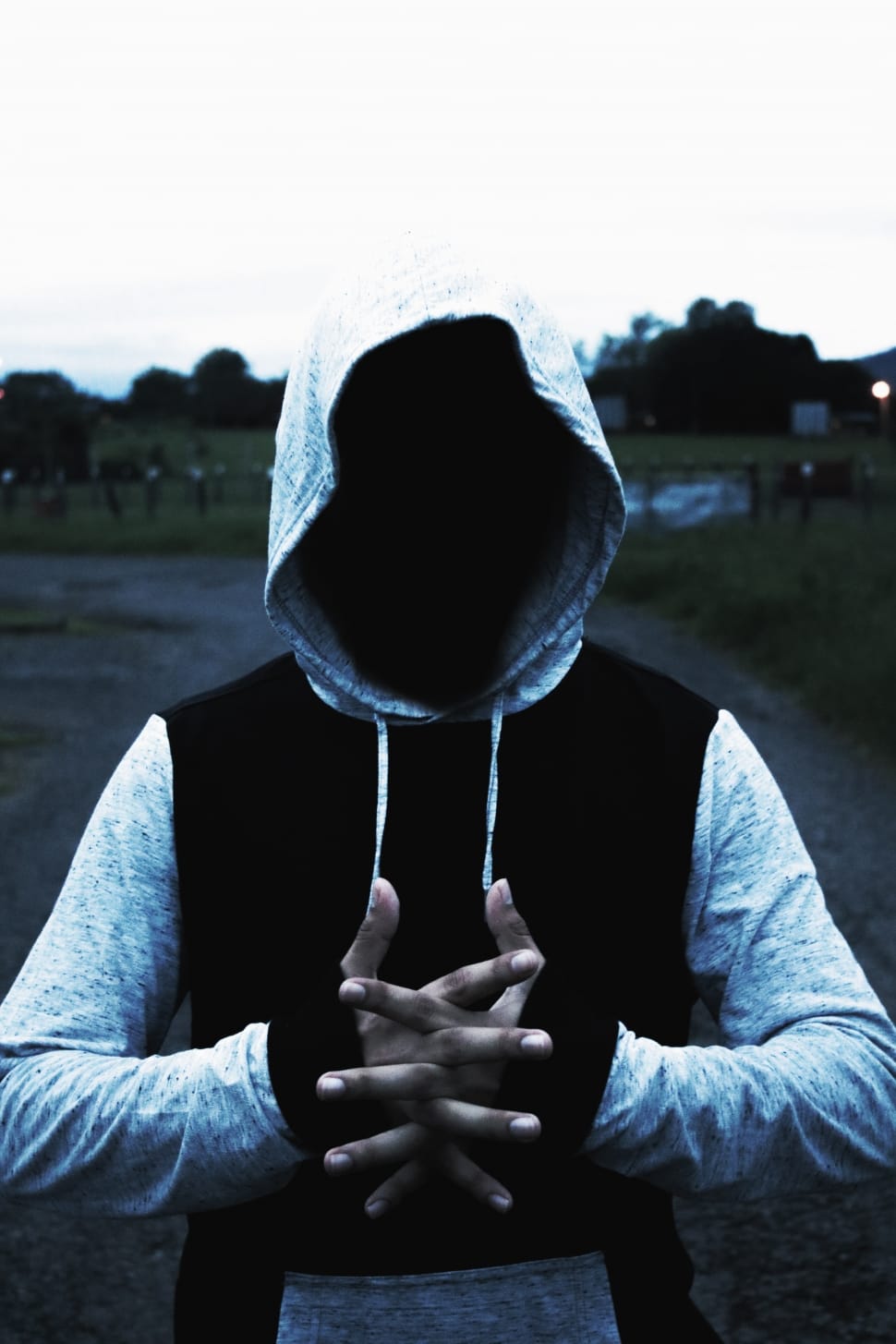 man in grey and black hooded jacket facing on camera free image