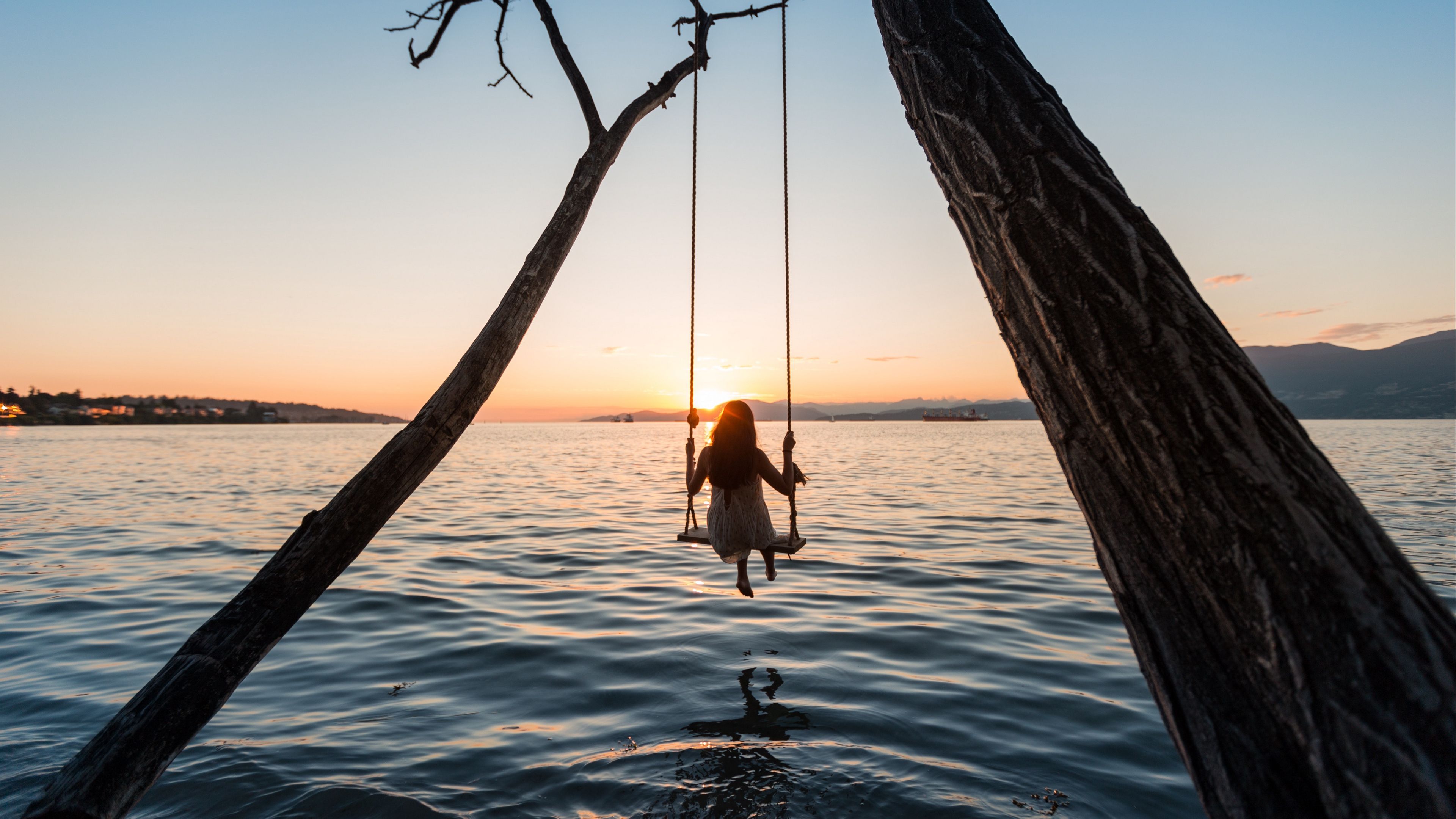 Download wallpaper 3840x2160 swing, girl, sunset, lake, river 4k