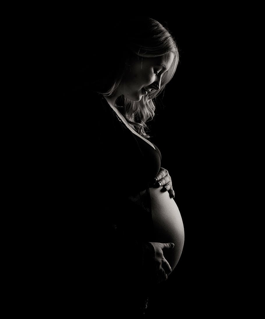HD wallpaper: grayscale photo of pregnant woman touching her belly
