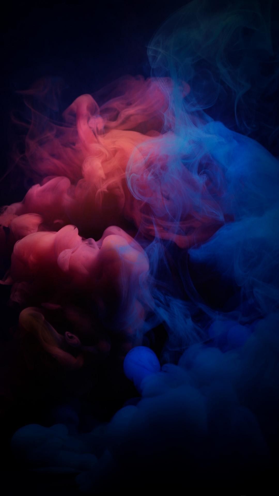 Premium Photo | A colorful smoke wallpaper with a black background and a rainbow  colored smoke wallpaper