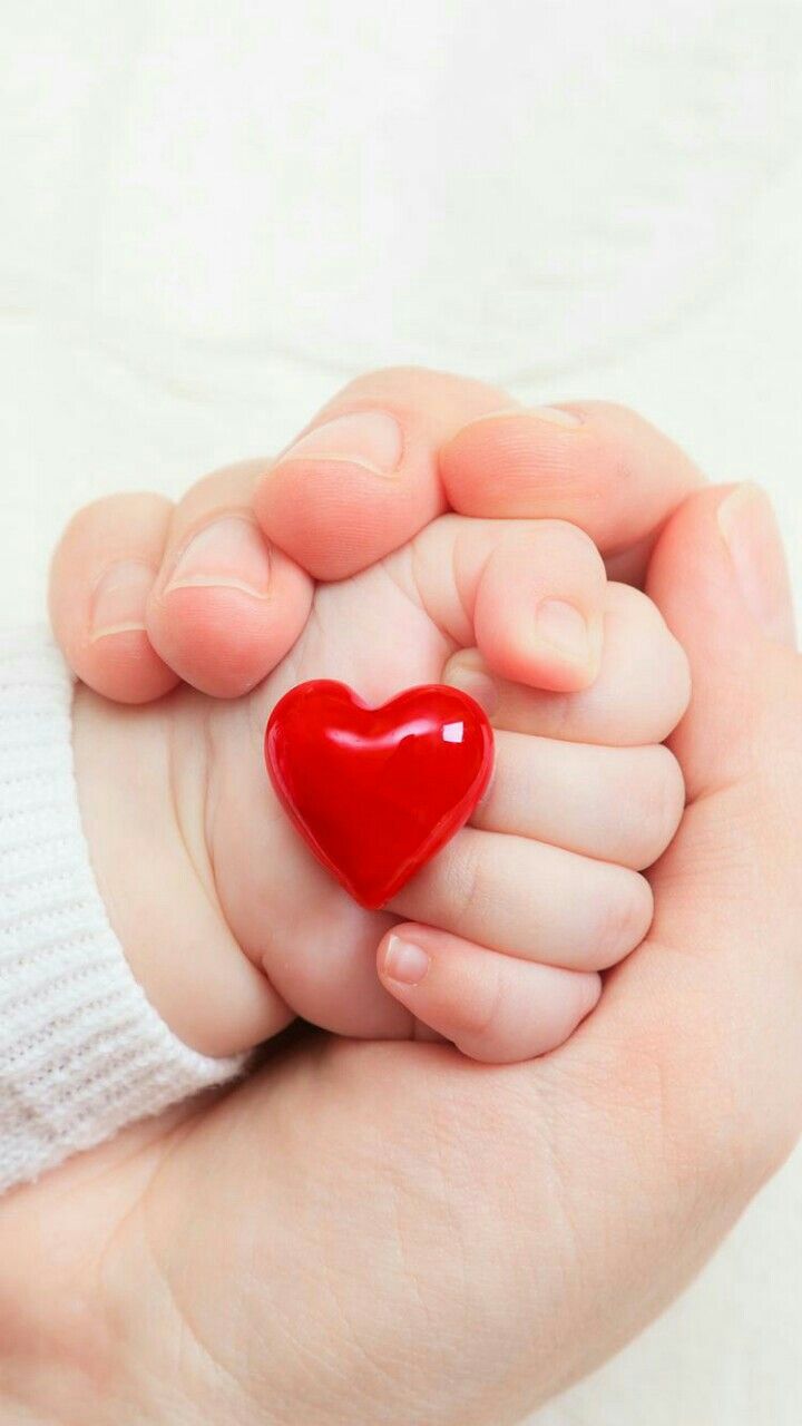 Baby And Mom Hand
