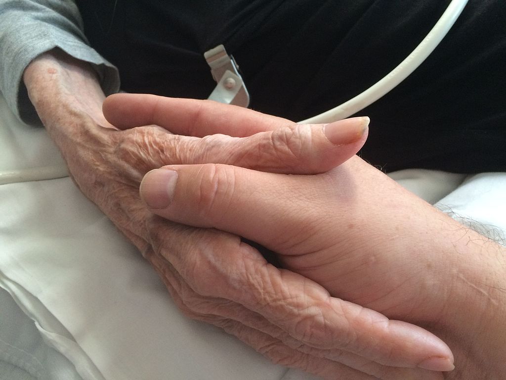 Mother and son holding