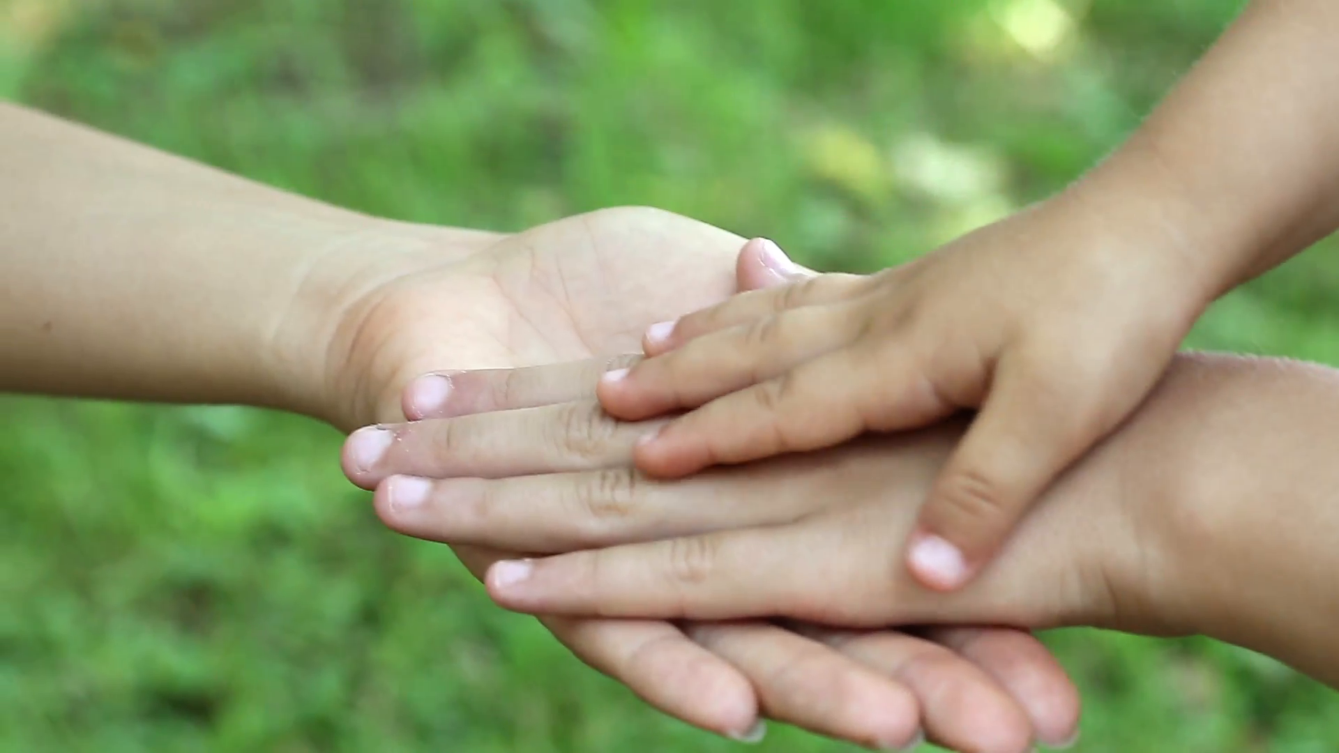 Mother and daughter walking hand in hand