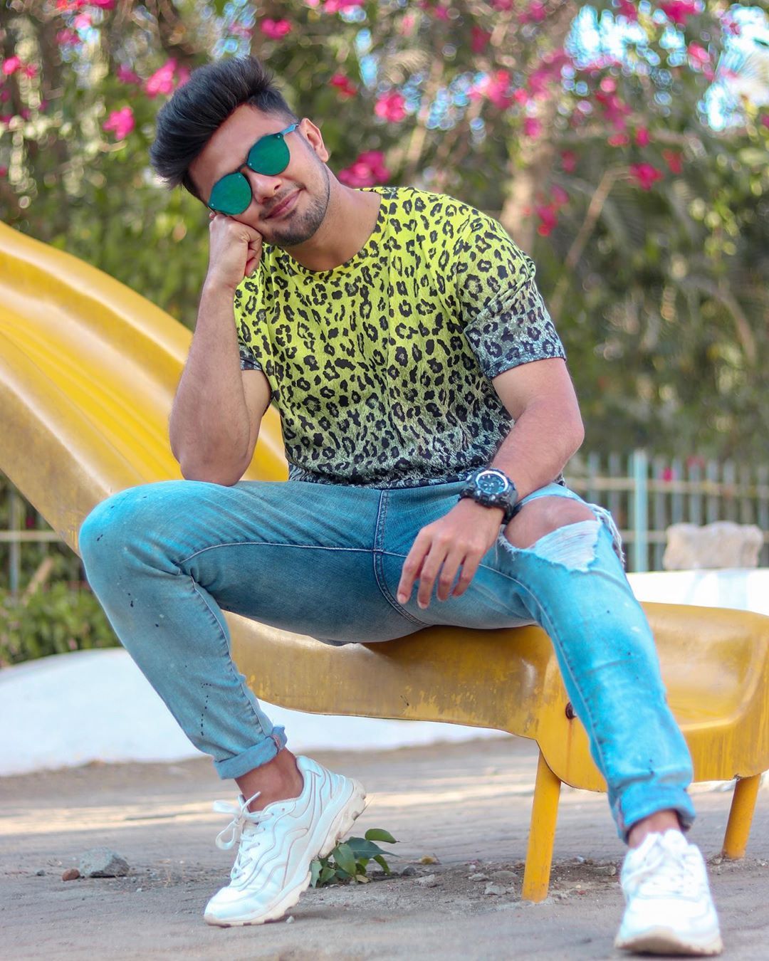 Image may contain: 1 person, sitting, shoes, child and outdoor